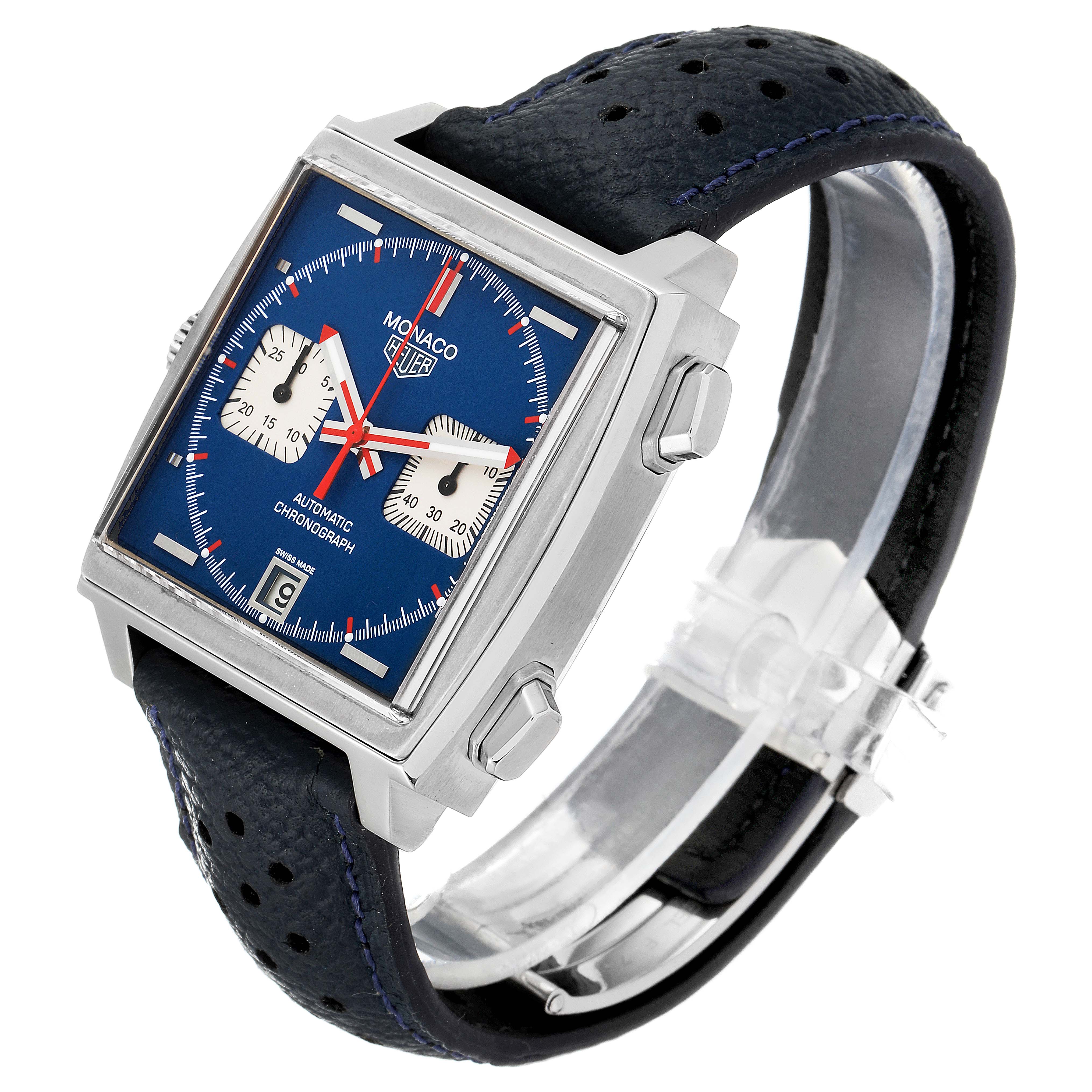 The image shows a side angle view of the Tag Heuer Monaco watch, highlighting its square dial, blue face, and leather strap.