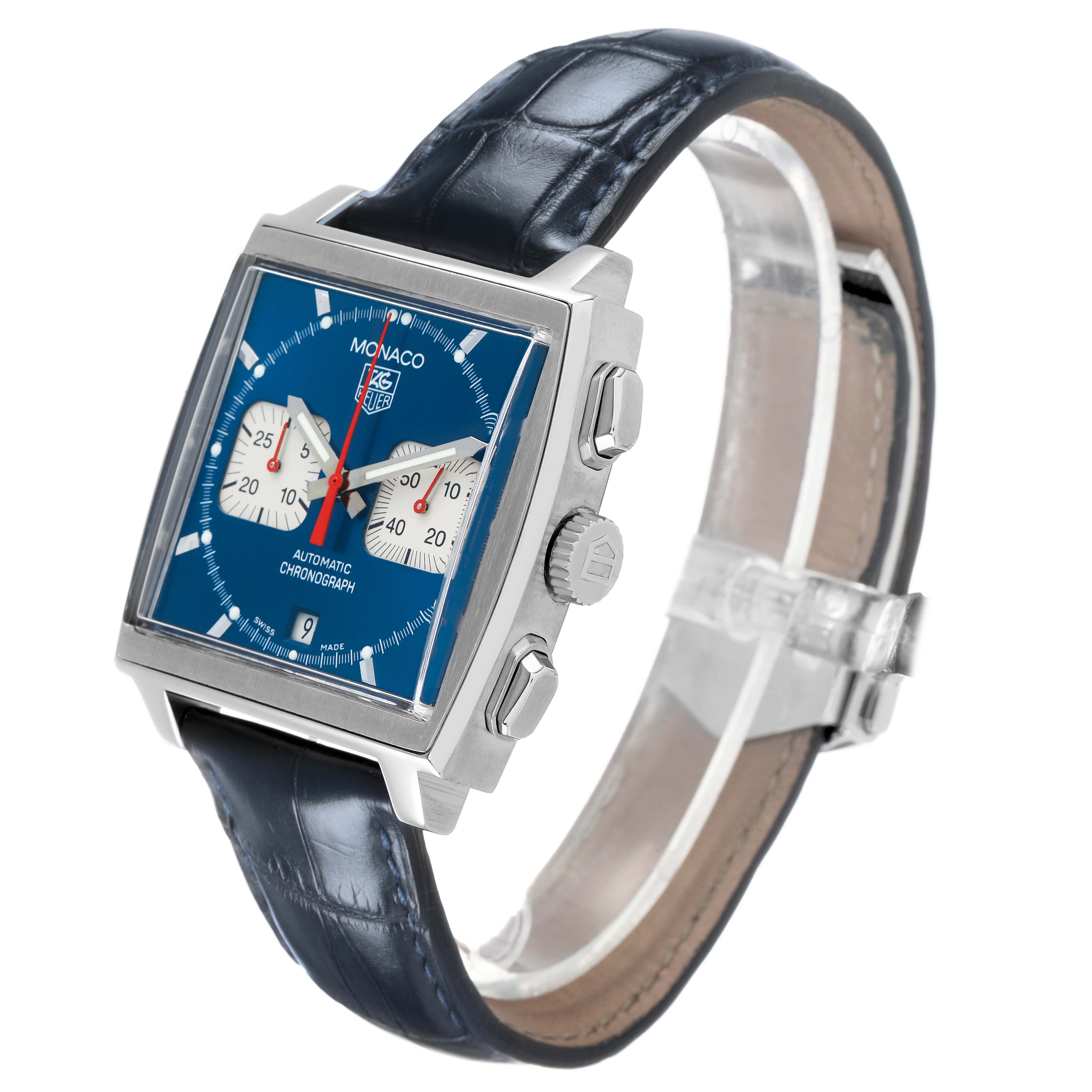 The Tag Heuer Monaco CW2113 Men's Stainless Steel Blue Dial watch is displayed from a three-quarter angle, showing the blue dial, side pushers, crown, and leather strap.
