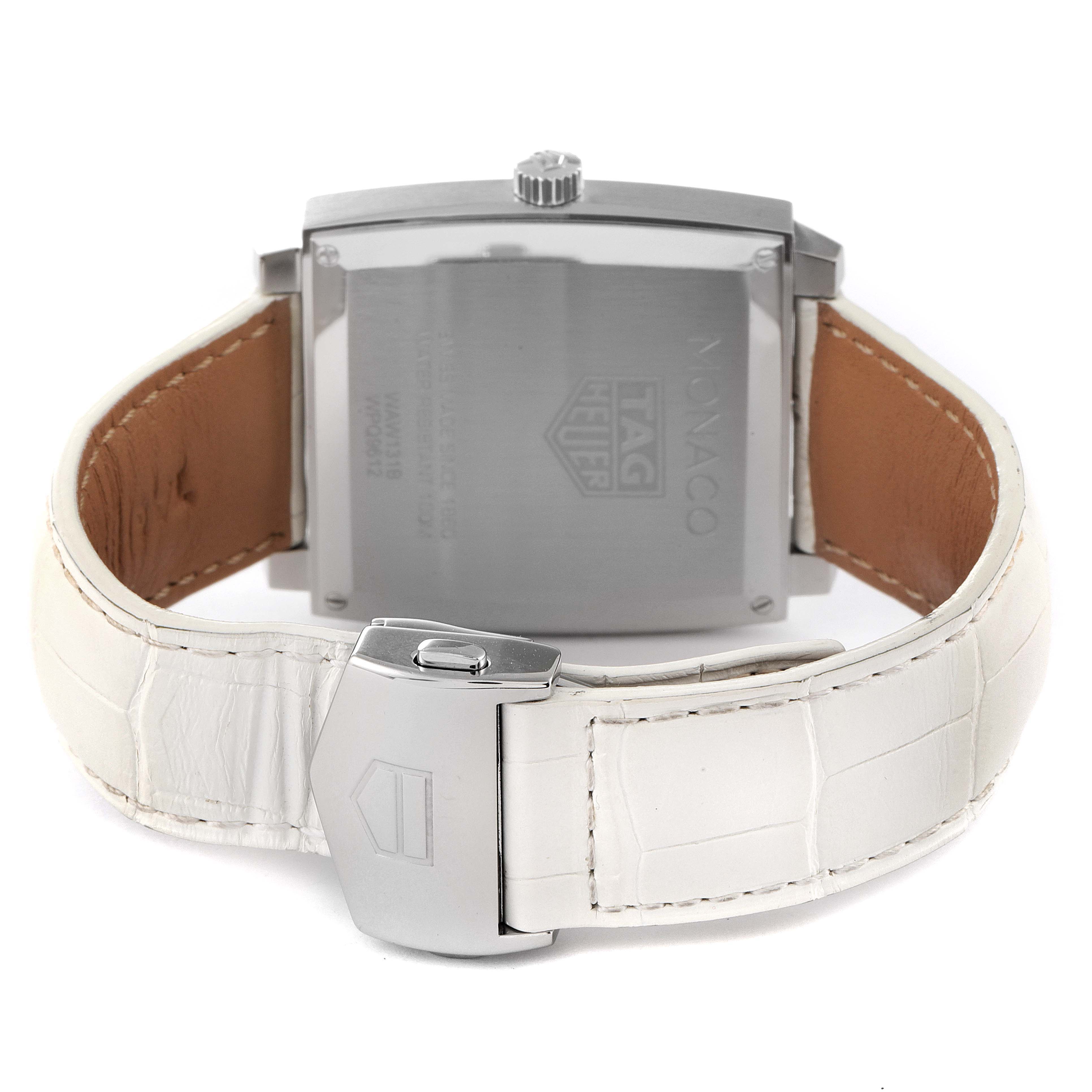 The image shows the back and clasp of a Tag Heuer Monaco WAW131B.FC6247 Women's Stainless Steel Mother of Pearl Dial WAW131B.FC6247 Women's Stainless Steel Mother of Pearl Dial watch with a white leather strap.