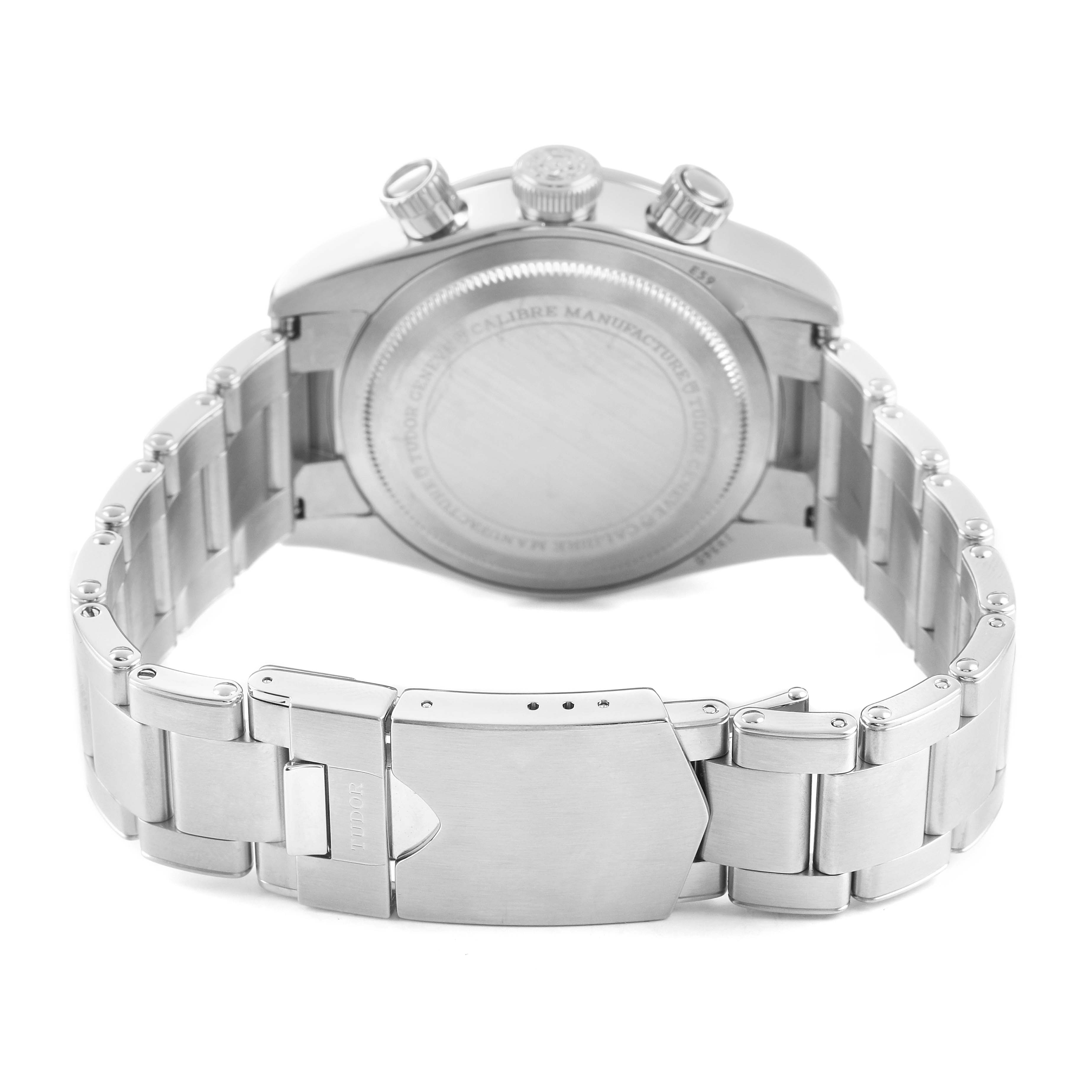 The image shows the back of the Tudor Heritage Black Bay 79360 Men's Stainless Steel Silver Dial watch, highlighting its stainless steel bracelet and clasp.