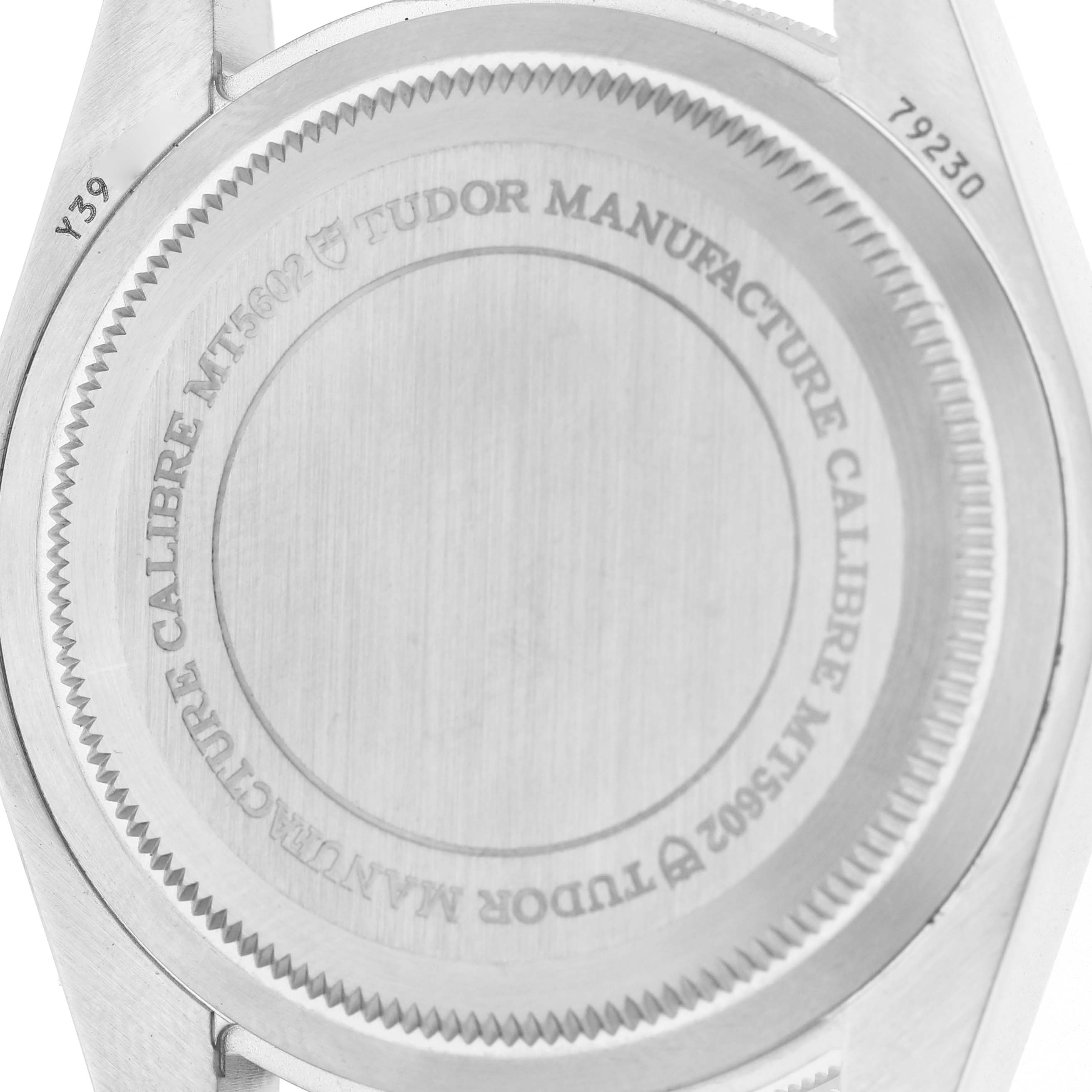 The image shows the case back of the Tudor Heritage Black Bay 79230R Men's Stainless Steel Black Dial watch, highlighting the engraved details and model number.