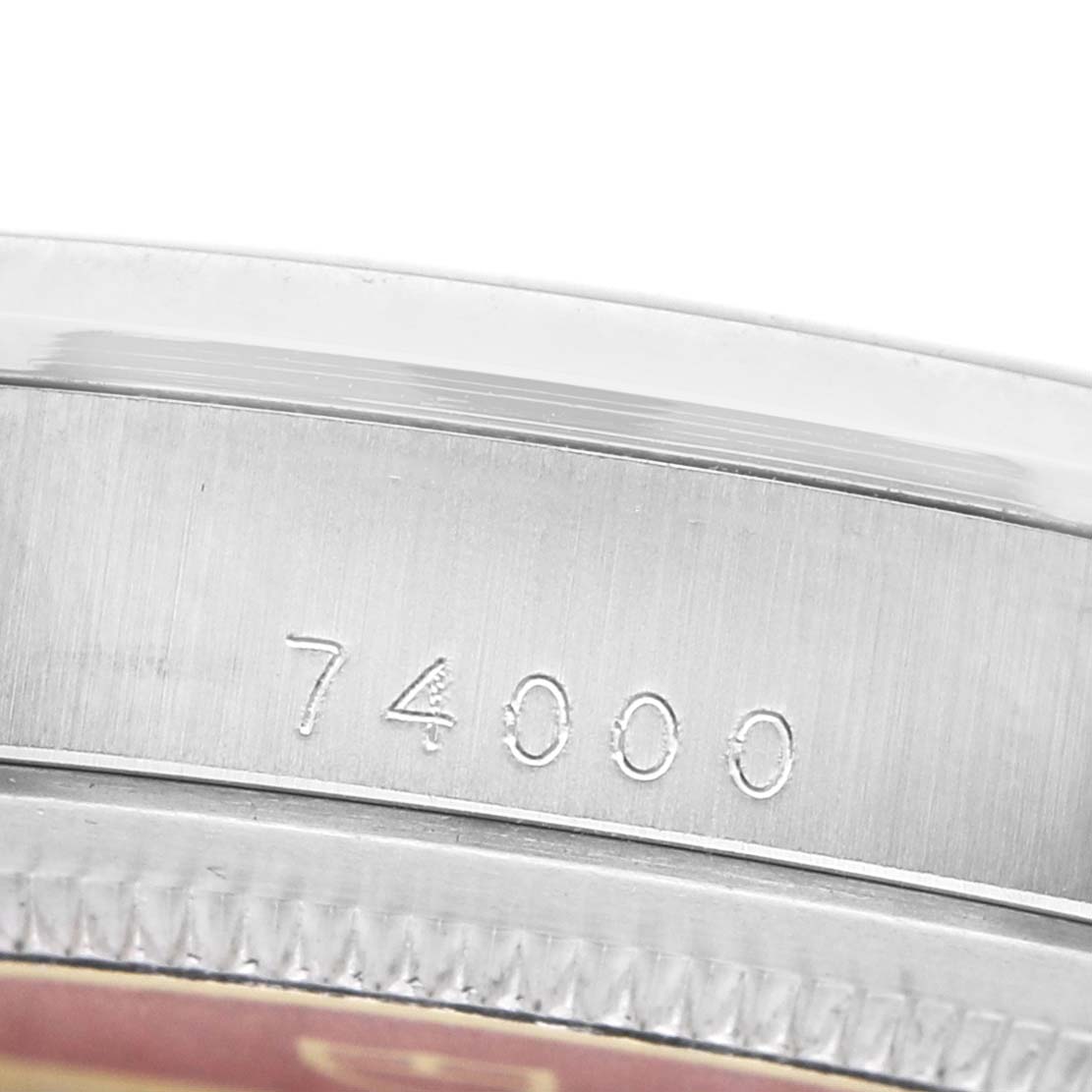 The image shows a close-up of the case side and bezel of the Tudor Prince 74000 Men's Stainless Steel Silver Dial model, highlighting the engraved number "74000."