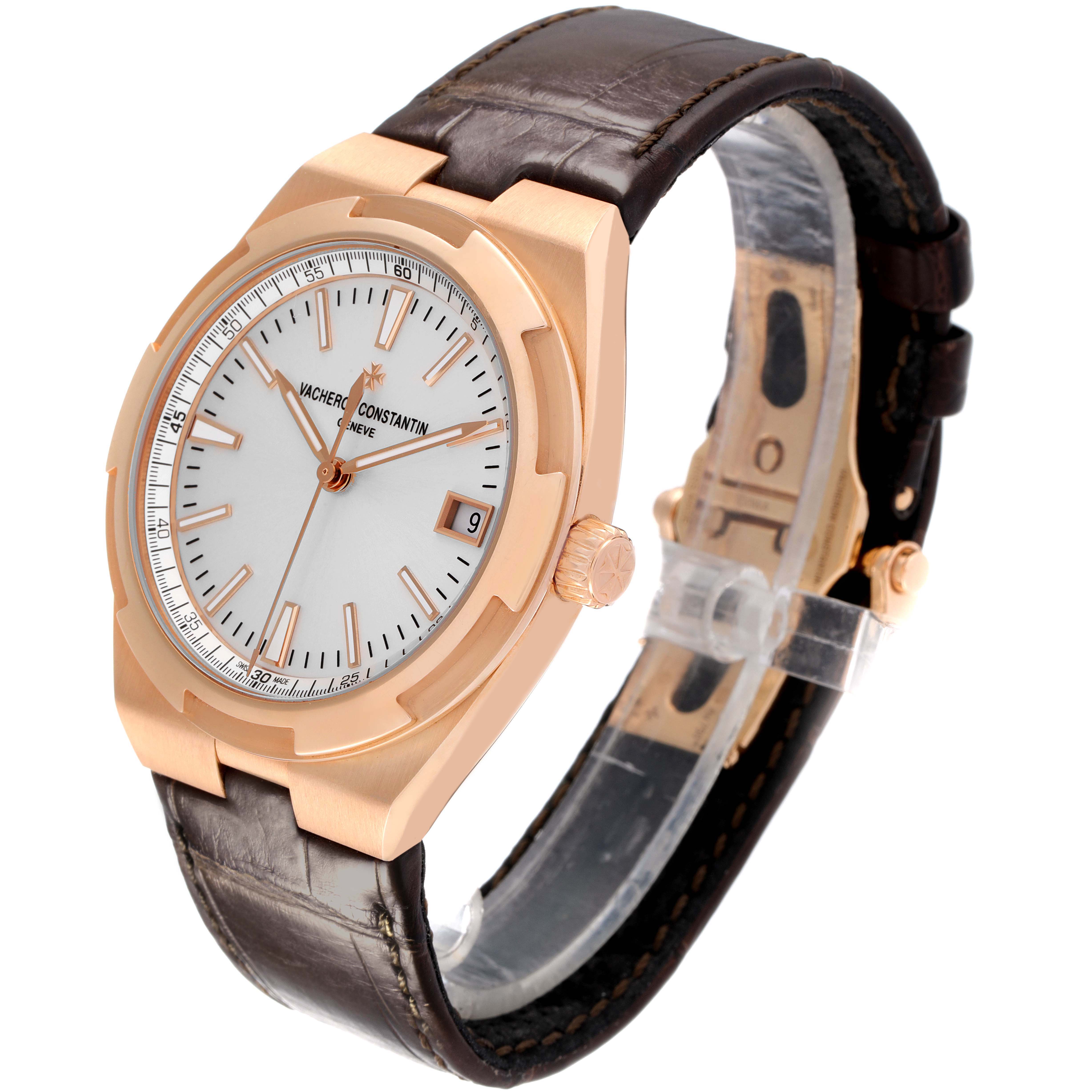 The Vacheron Constantin Overseas 4500V/000R-B127 Men's Rose Gold Silver Dial watch is shown at a three-quarter angle, highlighting its face, bezel, crown, and leather strap.