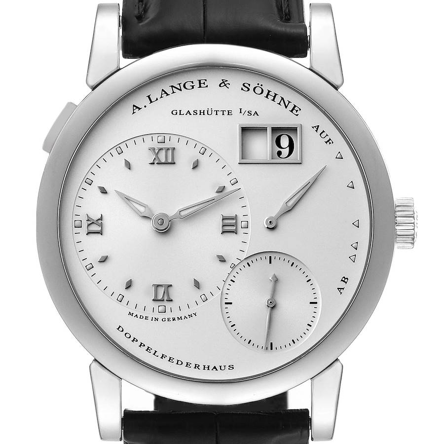 The image shows a frontal view of the Lange 1 model by A. Lange & Söhne, detailing its face, dials, and black leather strap.