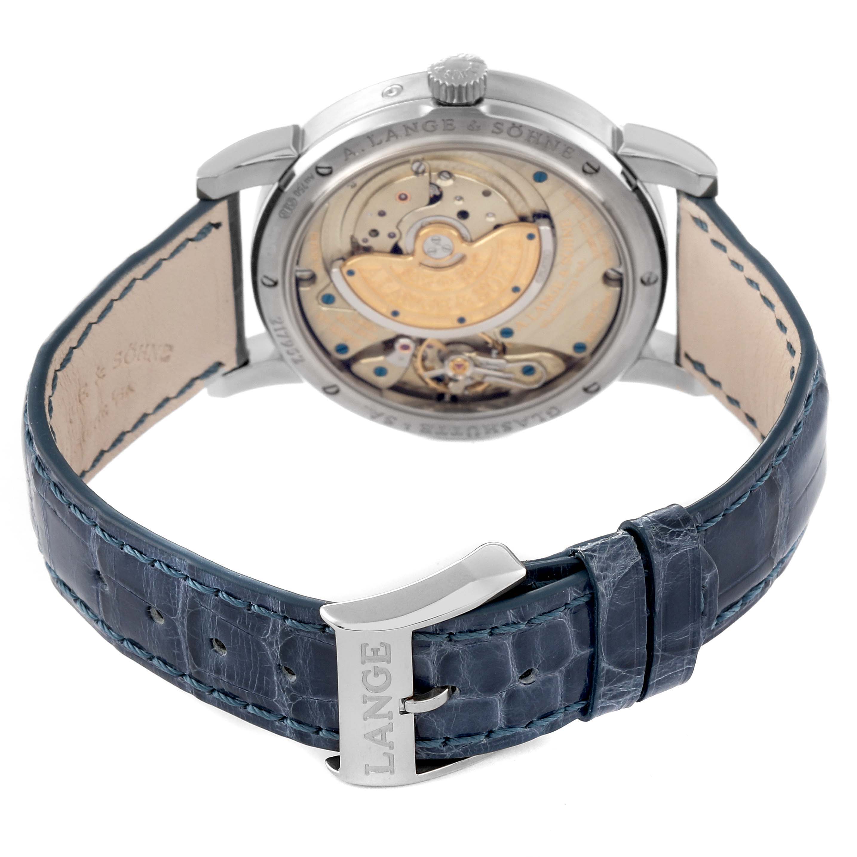 This image shows the back view of the A. Lange 
Sohne Saxonia 330.026 Men
s White Gold Silver Dial watch, highlighting its movement and blue leather strap.
