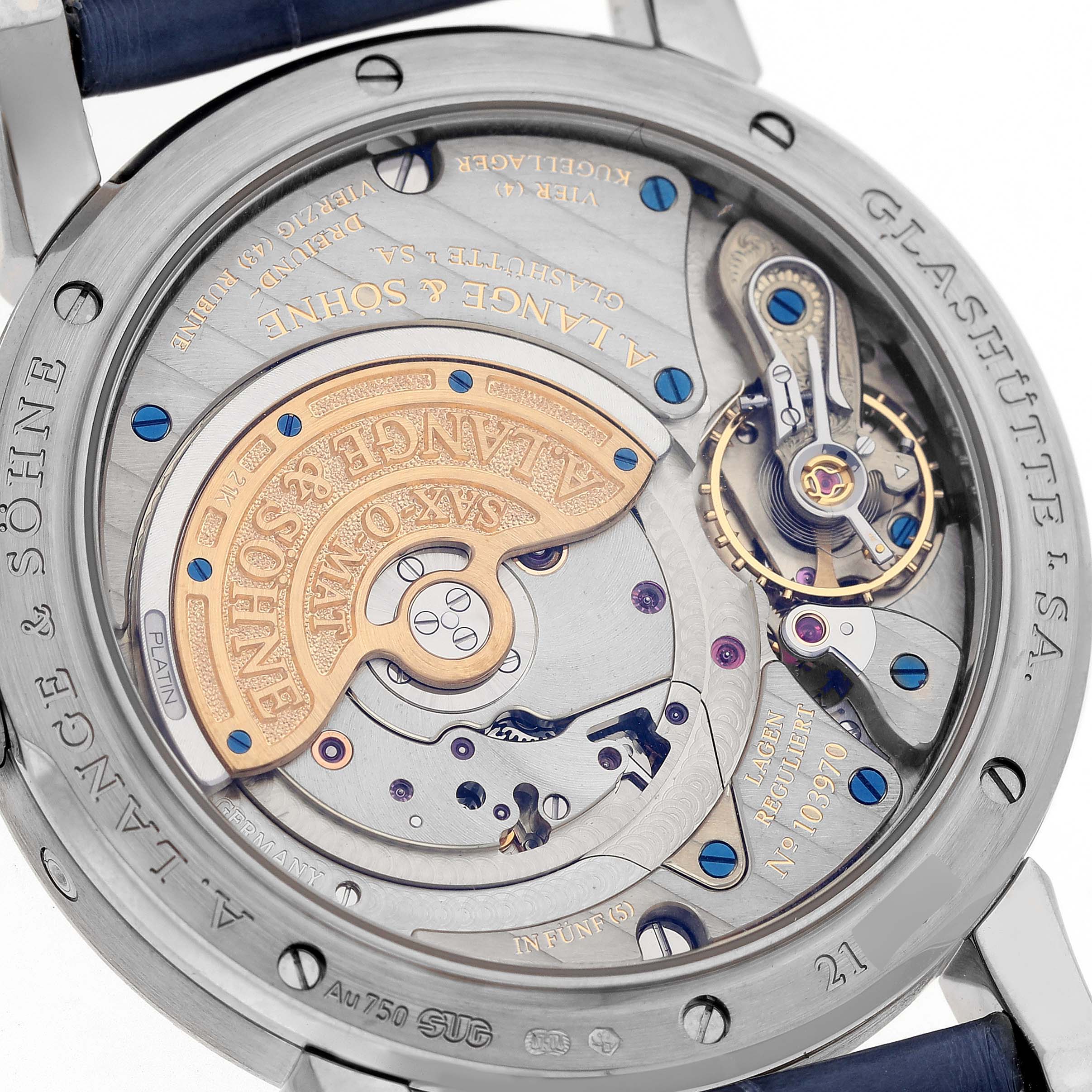 The image shows the back view of the A. Lange 
Sohne Saxonia 330.026 Men
s White Gold Silver Dial watch, highlighting the intricate movement and components.