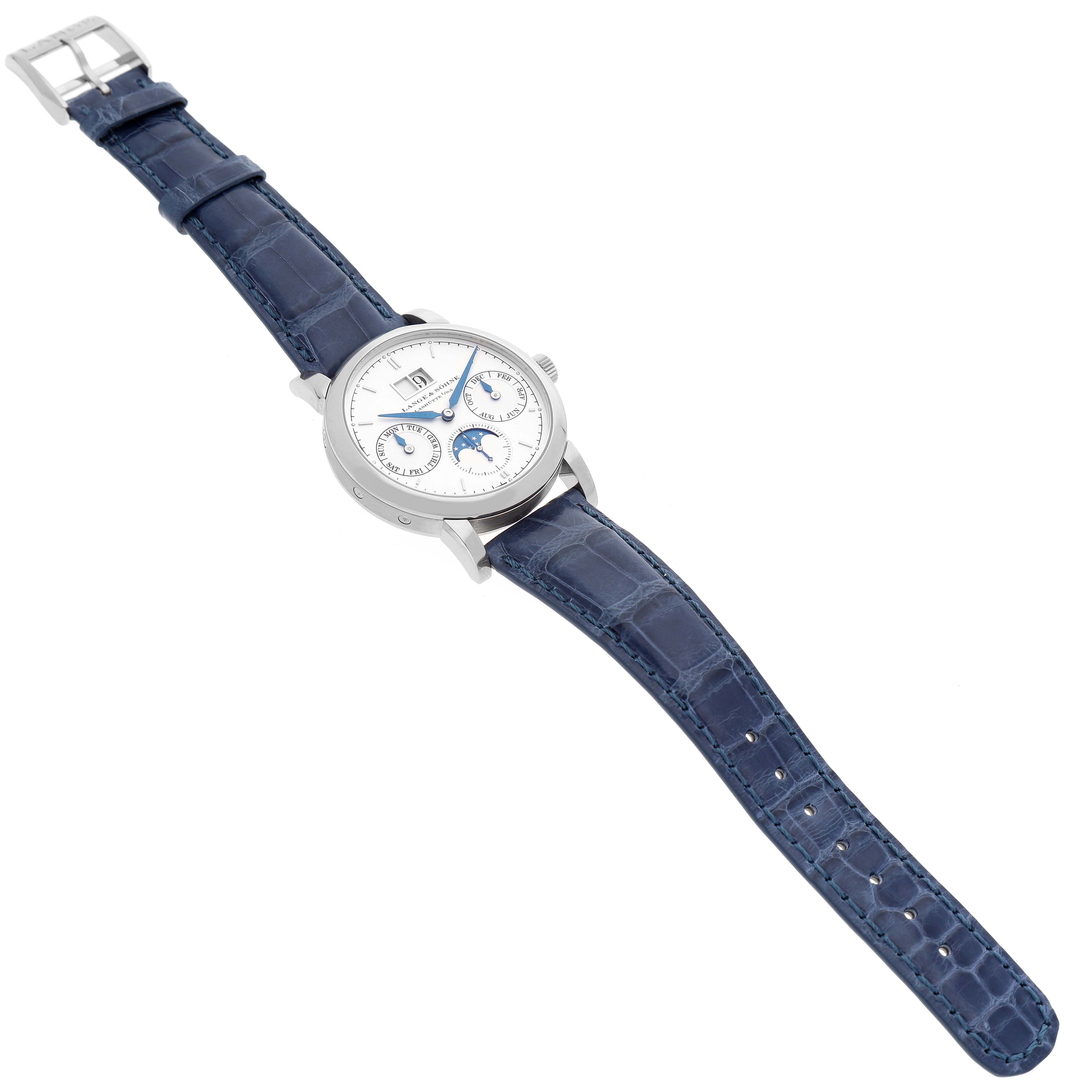 The A. Lange 
Sohne Saxonia 330.026 Men
s White Gold Silver Dial watch is shown from a top-down angle, highlighting its face and blue leather strap.