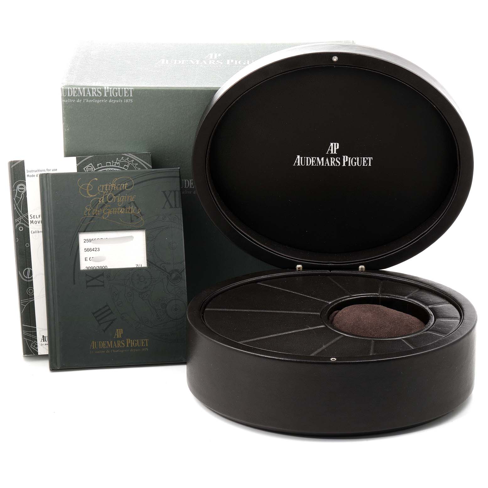 The image shows an open presentation box and accompanying documents for the Jules model by Audemars Piguet.