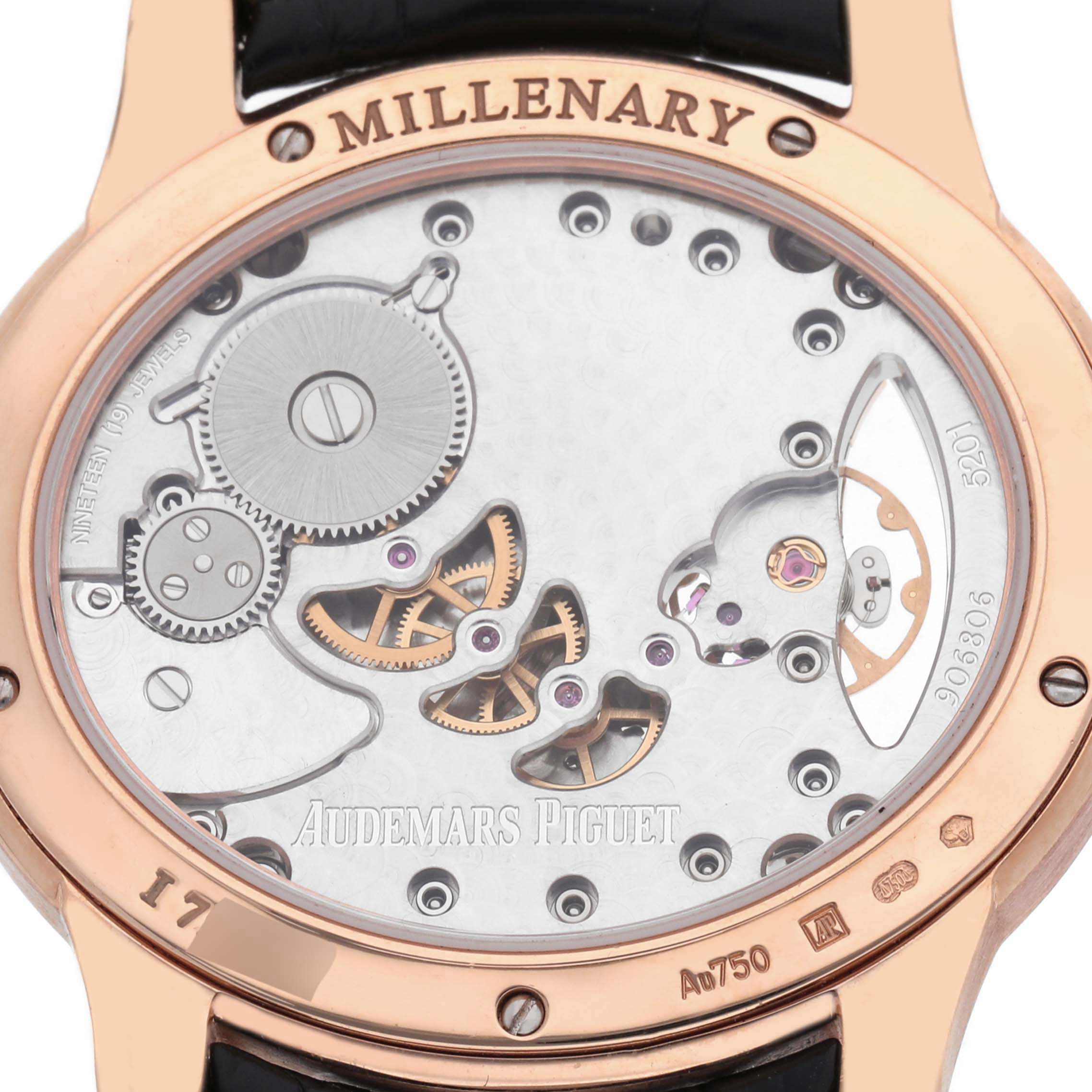 The image shows the back view of the Audemars Piguet Millenary 77247OR Women's Rose Gold Mother of Pearl Dial 77247OR Women's Rose Gold Mother of Pearl Dial watch, highlighting its movement and intricate gears.