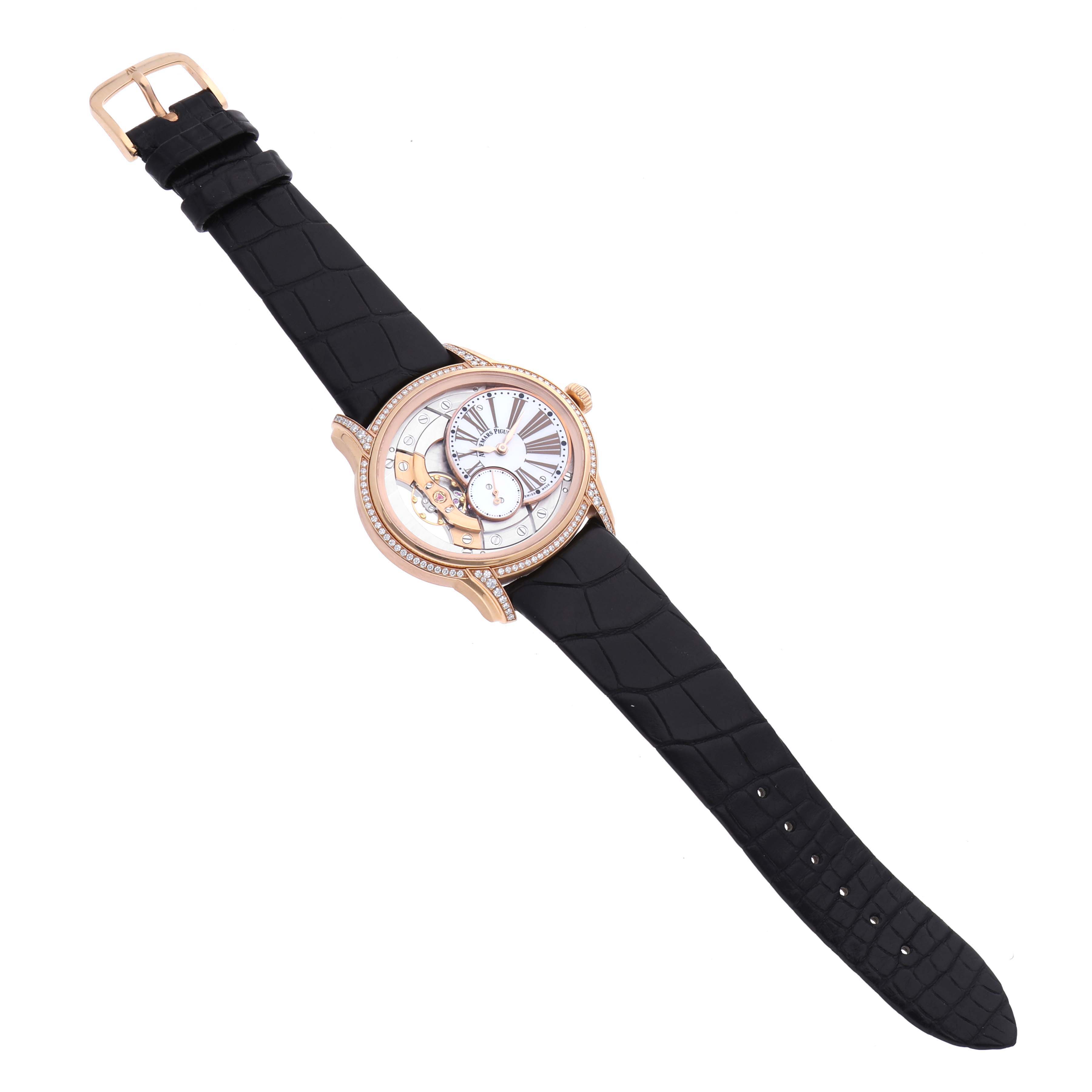 The Audemars Piguet Millenary 77247OR Women's Rose Gold Mother of Pearl Dial 77247OR Women's Rose Gold Mother of Pearl Dial watch is shown at a slight angle, displaying the face, strap, and side profile including the crown.