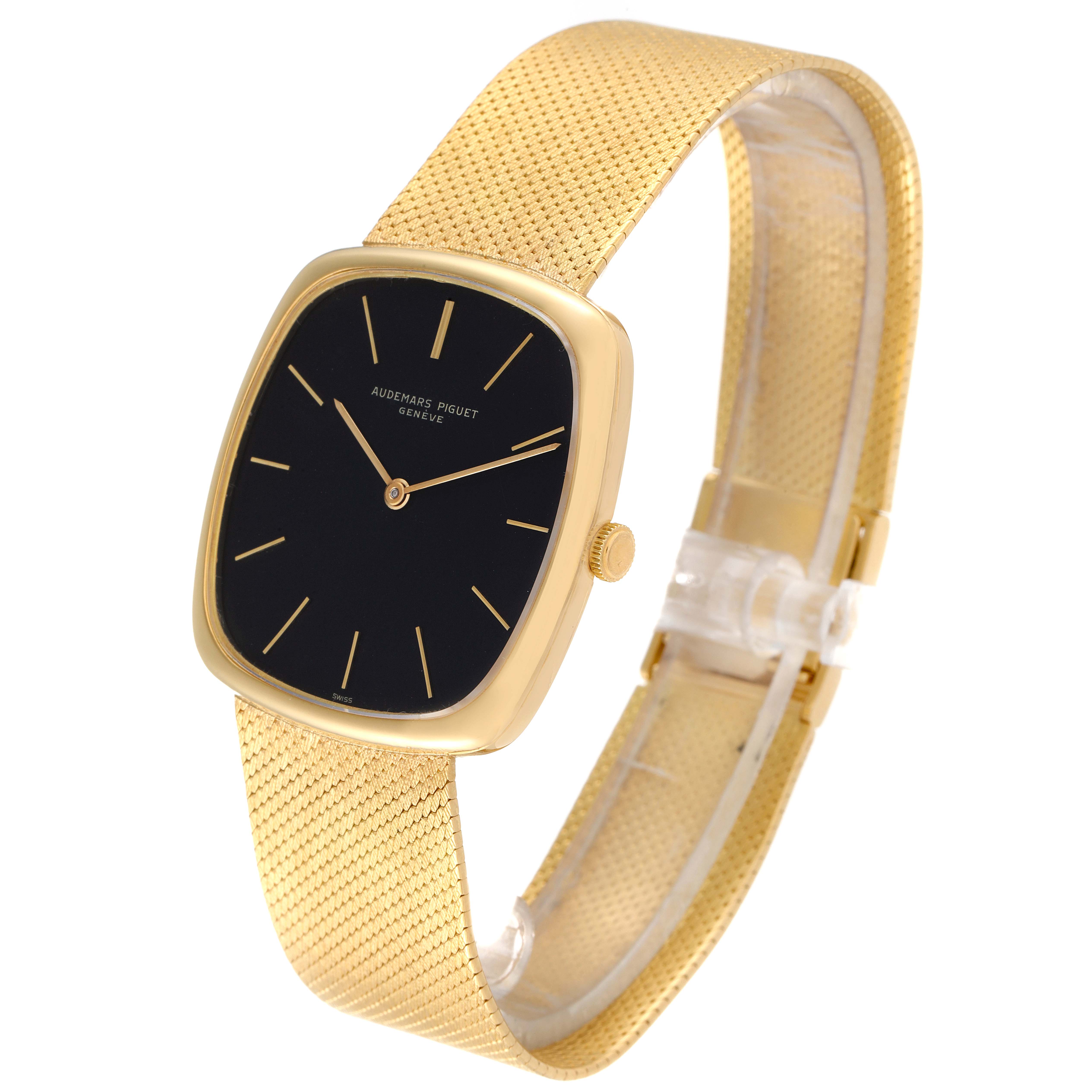 The image shows a side angle of the Audemars Piguet Vintage Men's Yellow Gold Black Dial Men's Yellow Gold Black Dial model with a gold case, black dial, and gold mesh strap.