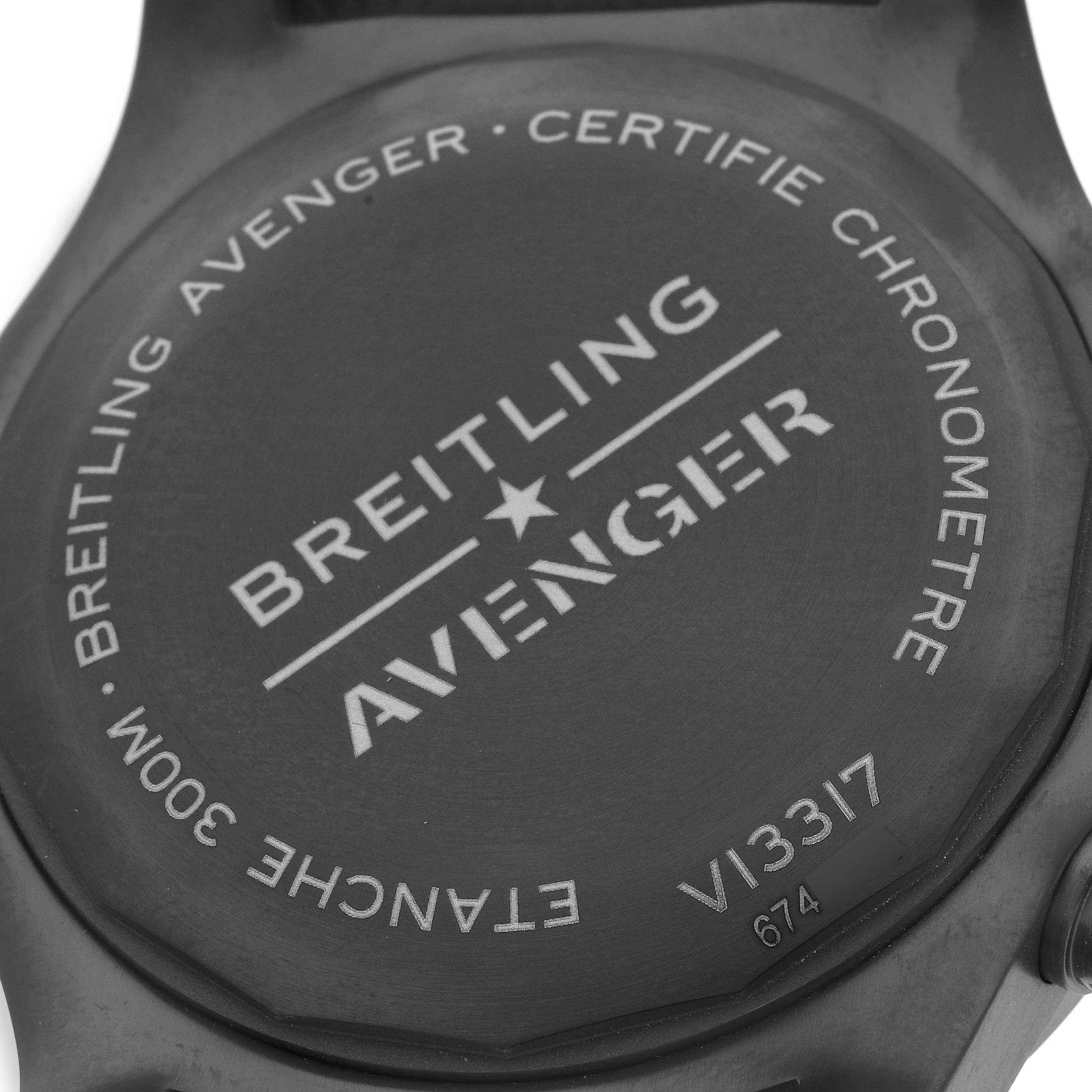The image shows the back case of the Breitling Avenger V13317 Men's Titanium Black Dial V13317 Men's Titanium Black Dial watch, highlighting brand details and model specifications.