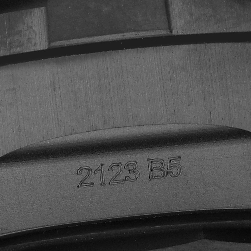 The image shows a close-up of the engraved back casing of a Breitling Avenger V13317 Men's Titanium Black Dial V13317 Men's Titanium Black Dial watch.