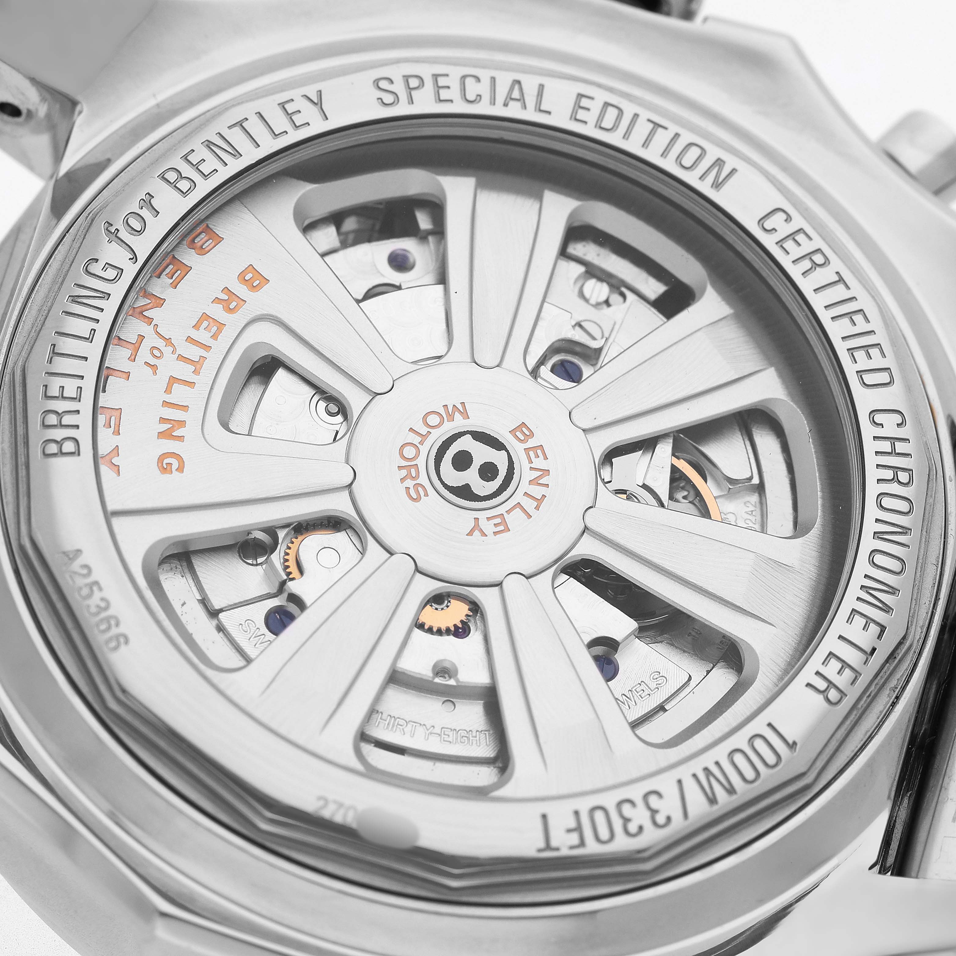 The image shows the transparent case back of a Breitling for Bentley watch, highlighting the rotor and movement details.
