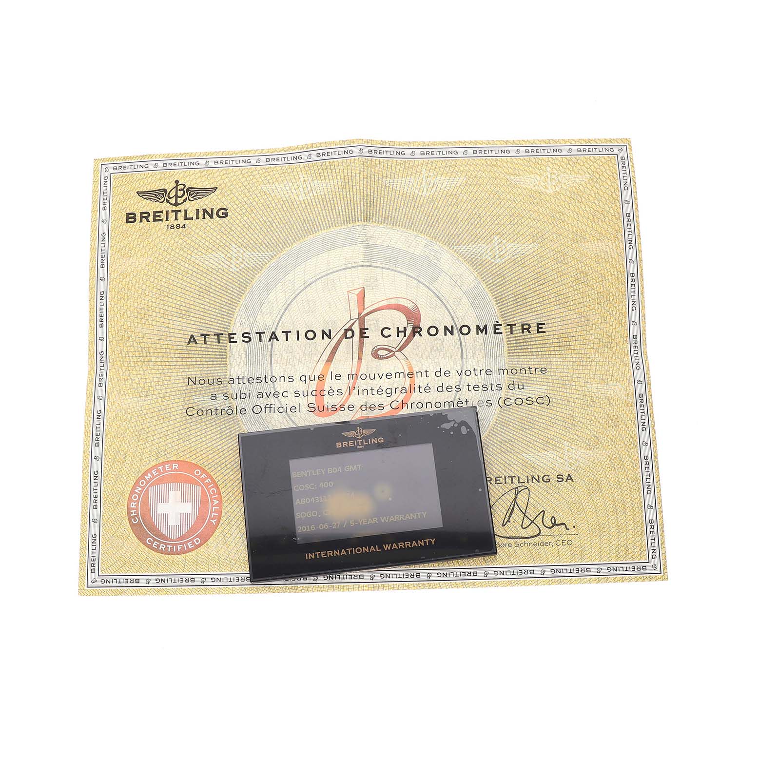 The image shows a Breitling Bentley AB0431 Men's Stainless Steel Silver Dial model chronometer certificate and an international warranty card.