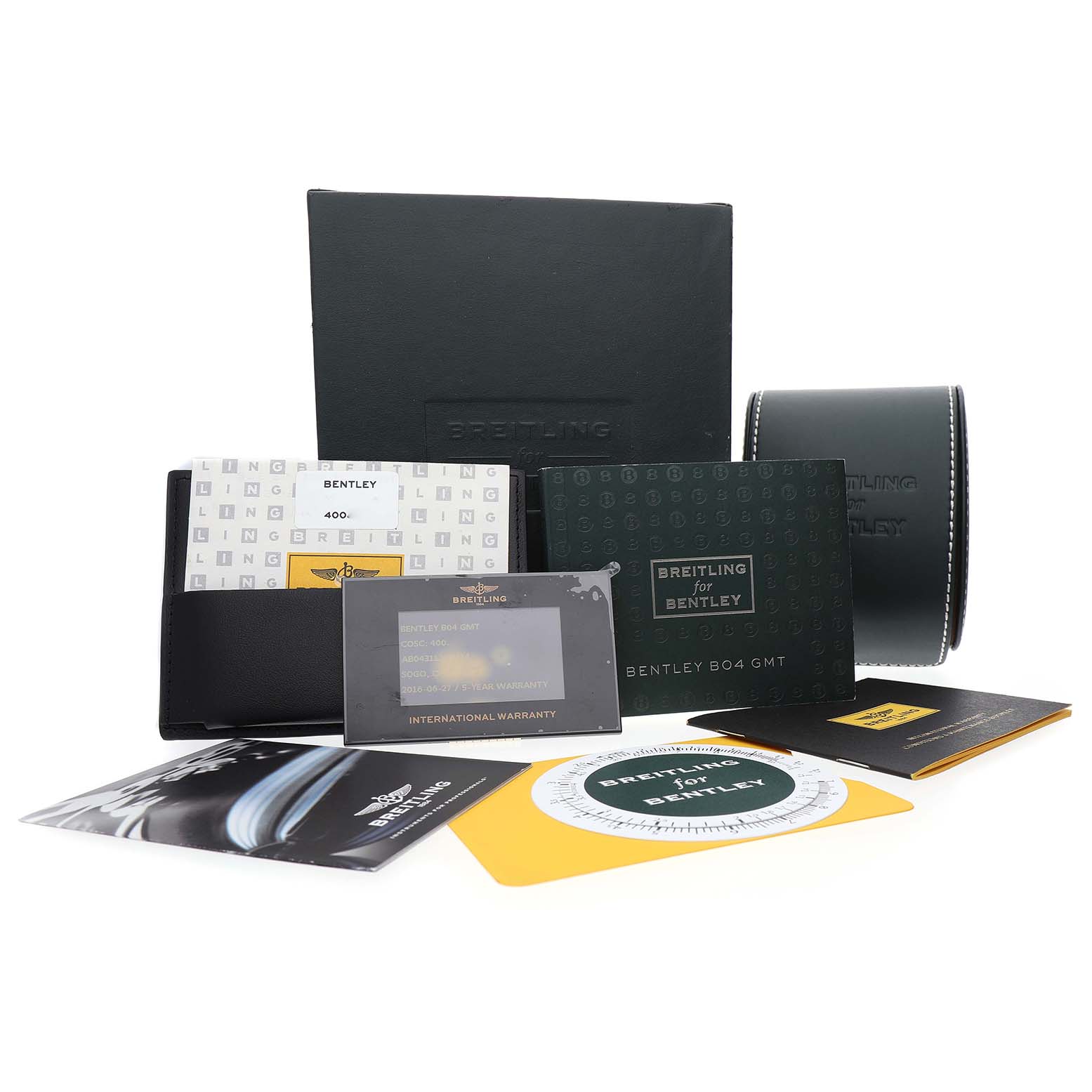 The image shows accessories for the Breitling Bentley AB0431 Men's Stainless Steel Silver Dial model, including a box, manuals, a warranty card, and a watch case.
