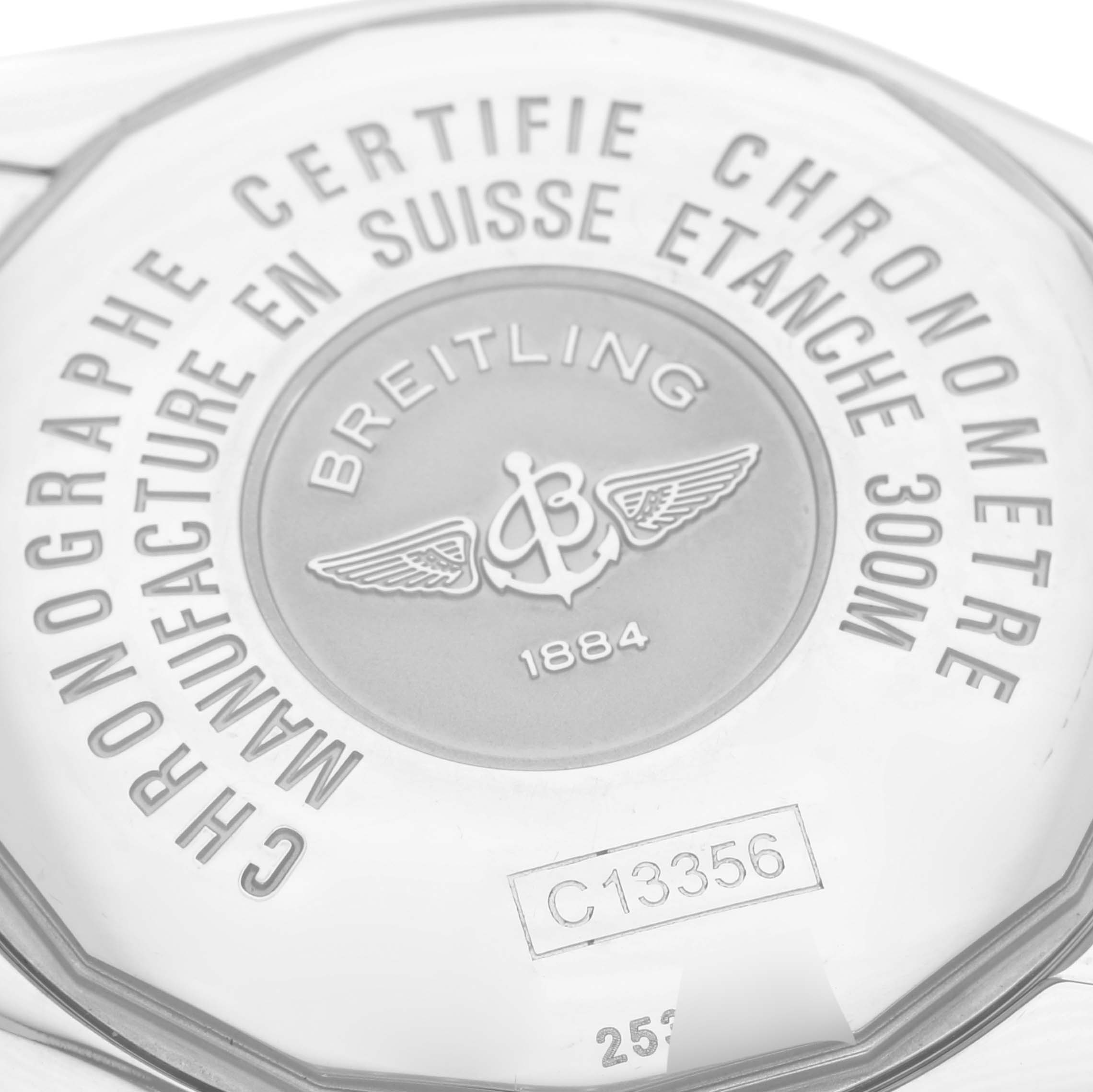 The image shows the back case of a Breitling Chronomat C156A19PAC Men
s Steel and Gold (two tone) Silver Dial C156A19PAC Men
s Steel and Gold (two tone) Silver Dial watch, highlighting engravings and branding details.