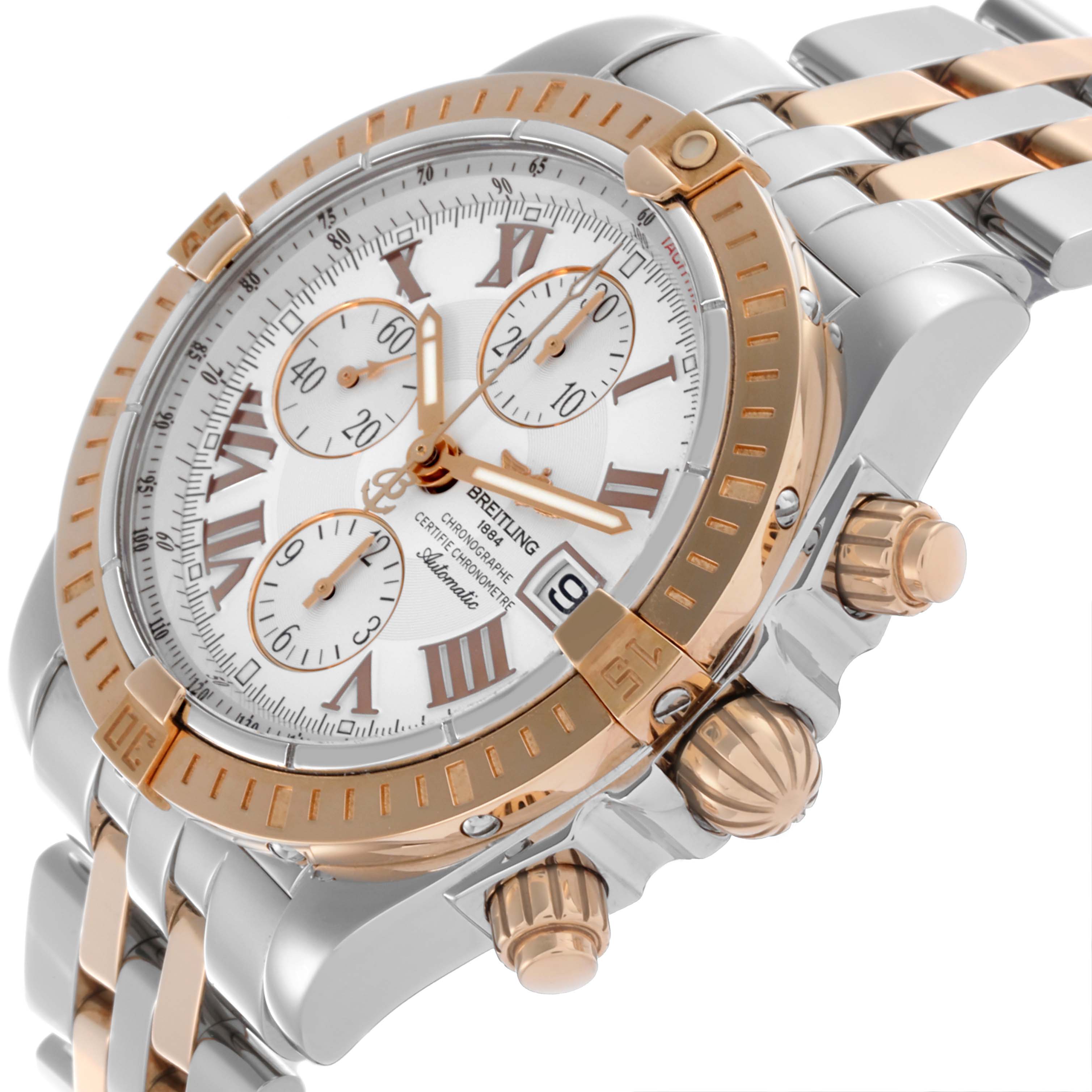 The Breitling Chronomat C156A19PAC Men
s Steel and Gold (two tone) Silver Dial C156A19PAC Men
s Steel and Gold (two tone) Silver Dial watch is shown at an angled close-up, highlighting the face, bezel, pushers, and part of the bracelet.