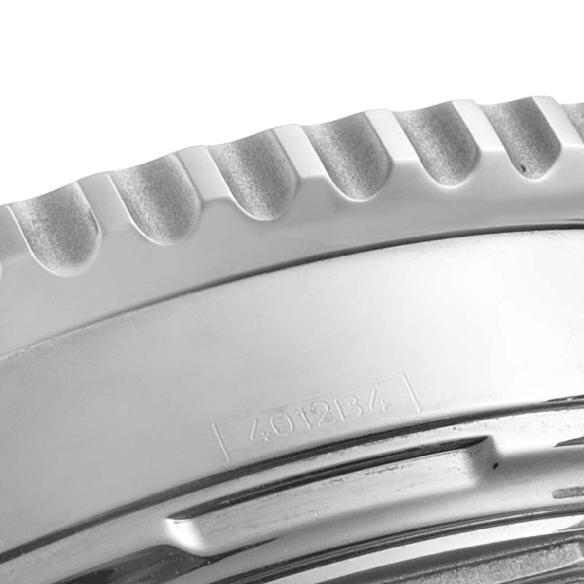 This close-up image shows the bezel and part of the case of a Breitling Navitimer AB0120 Men's Stainless Steel Black Dial AB0120 Men's Stainless Steel Black Dial watch.