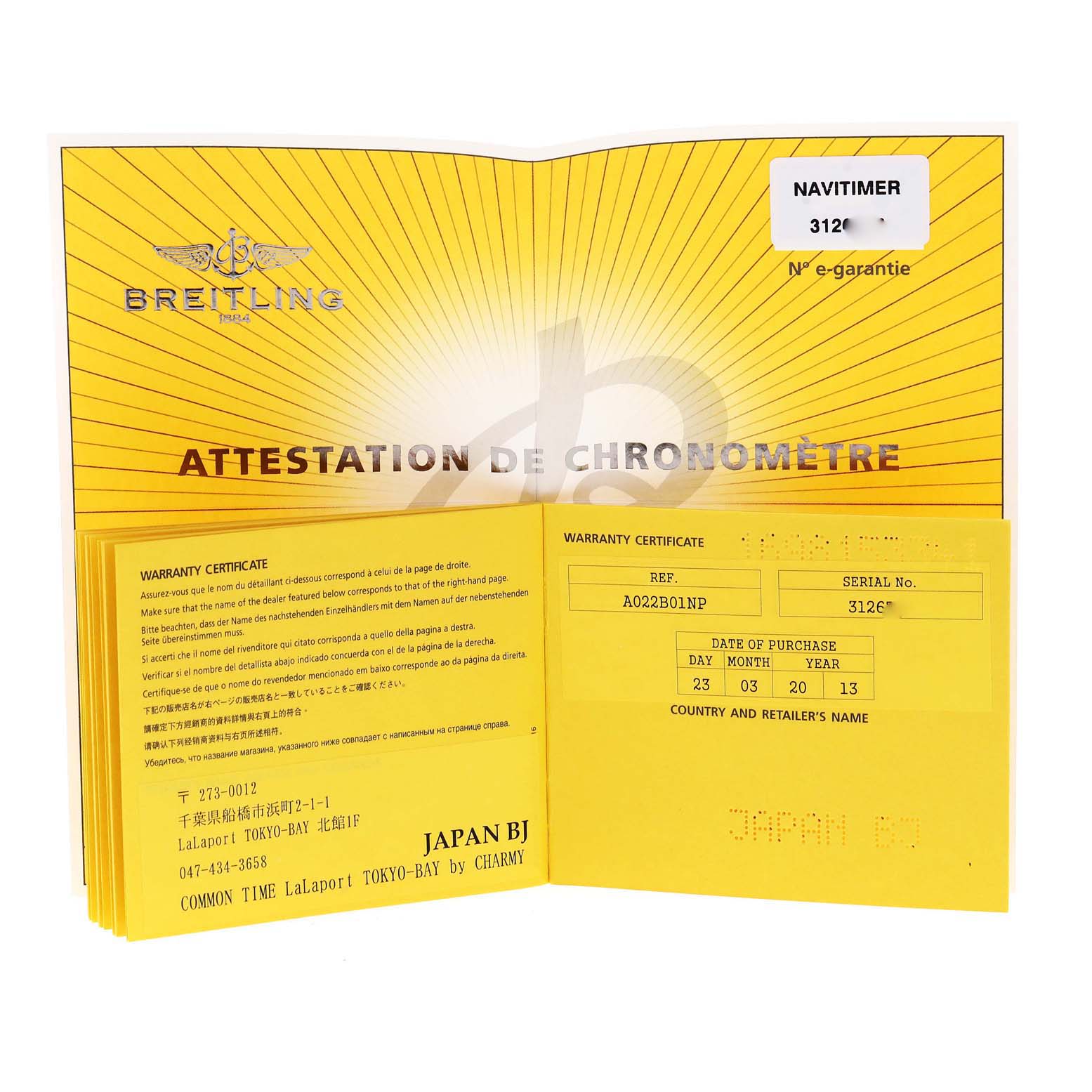 The image shows the warranty certificate and attestation de chronomètre for a Breitling Navitimer AB0120 Men's Stainless Steel Black Dial AB0120 Men's Stainless Steel Black Dial watch.