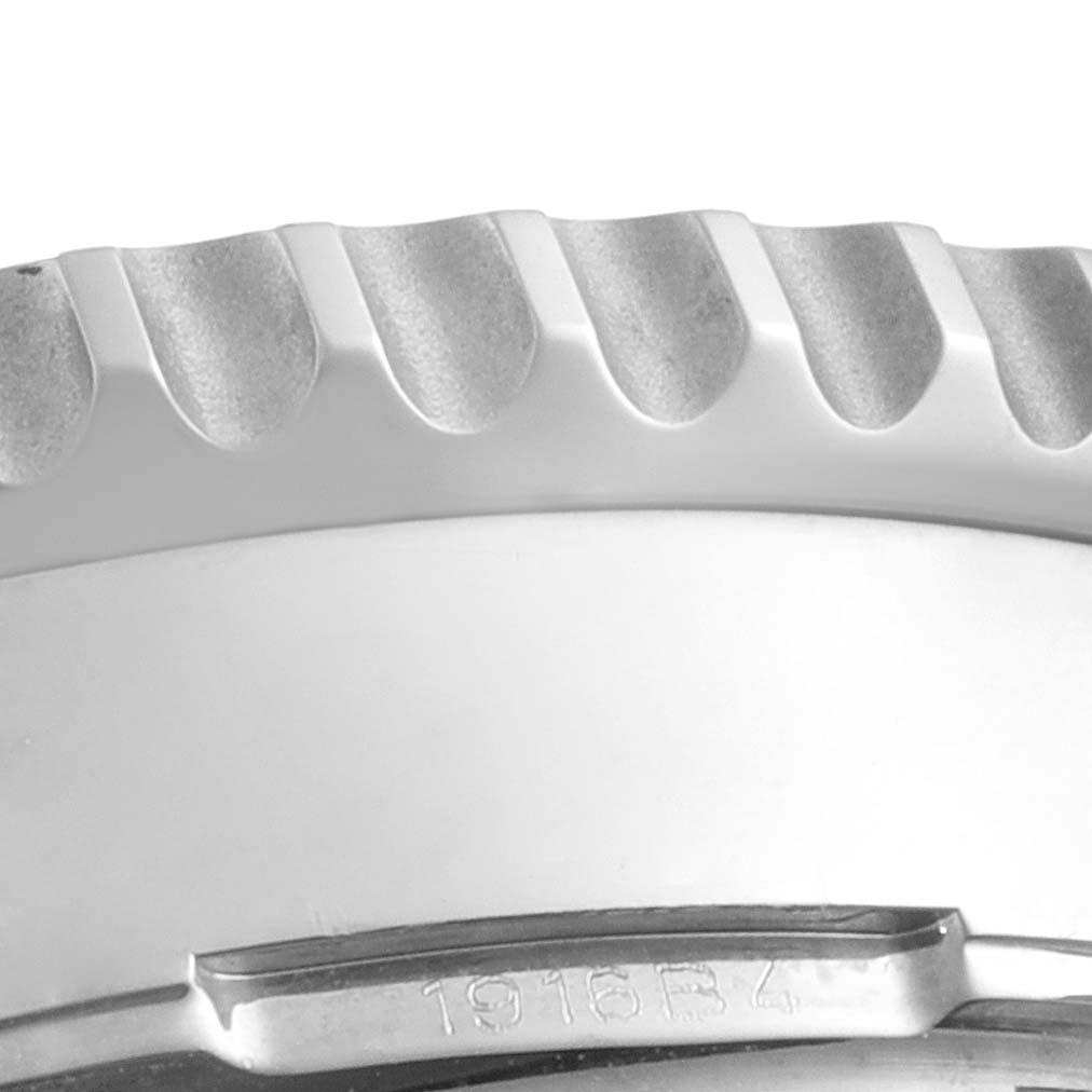 This close-up image shows the engraved bezel and part of the case of the Breitling Navitimer AB044121/BD24/443A Men's Stainless Steel Black Dial AB044121/BD24/443A Men's Stainless Steel Black Dial watch.