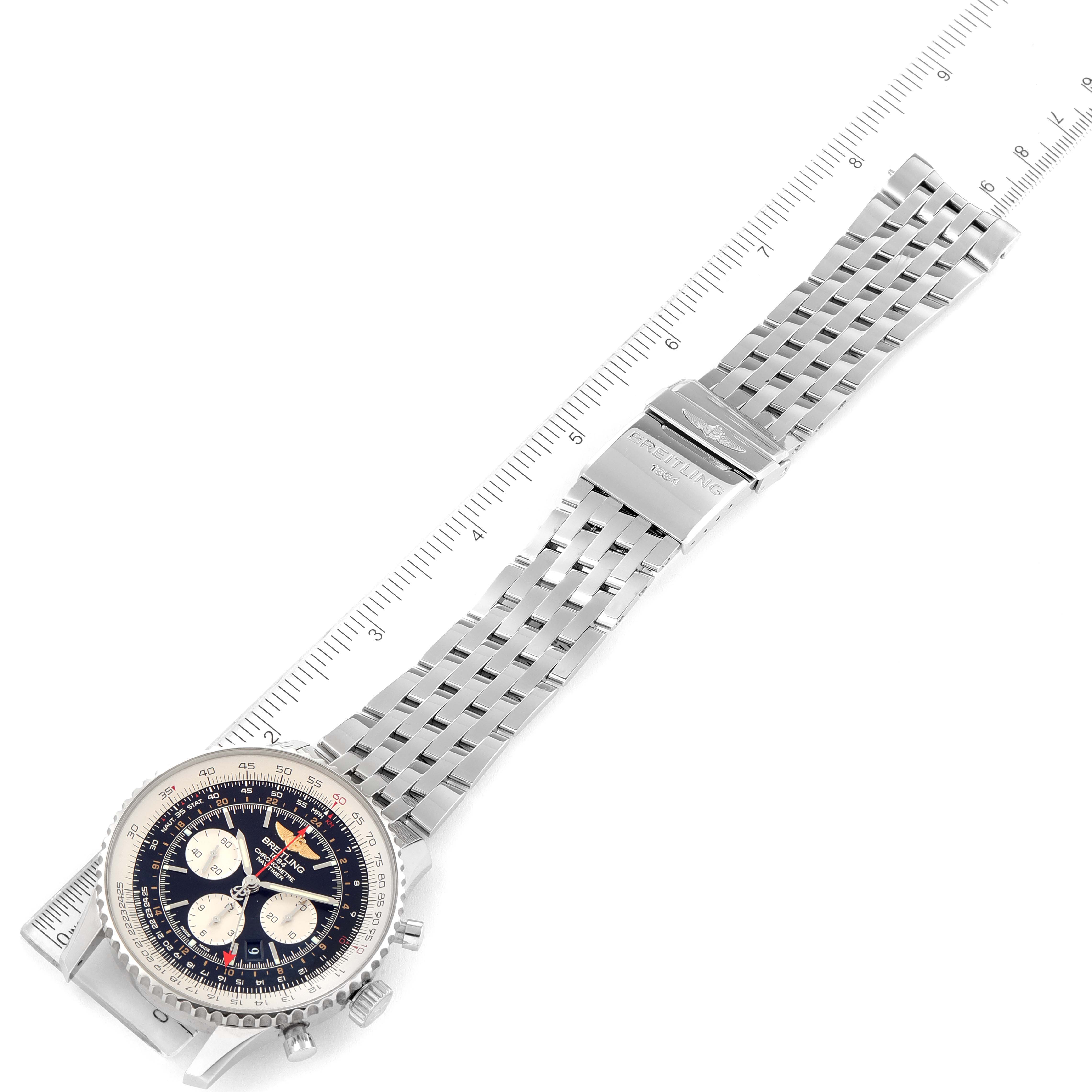 The image shows a Breitling Navitimer AB044121/BD24/443A Men's Stainless Steel Black Dial AB044121/BD24/443A Men's Stainless Steel Black Dial watch laid flat with its face, stainless steel band, and a ruler for scale.