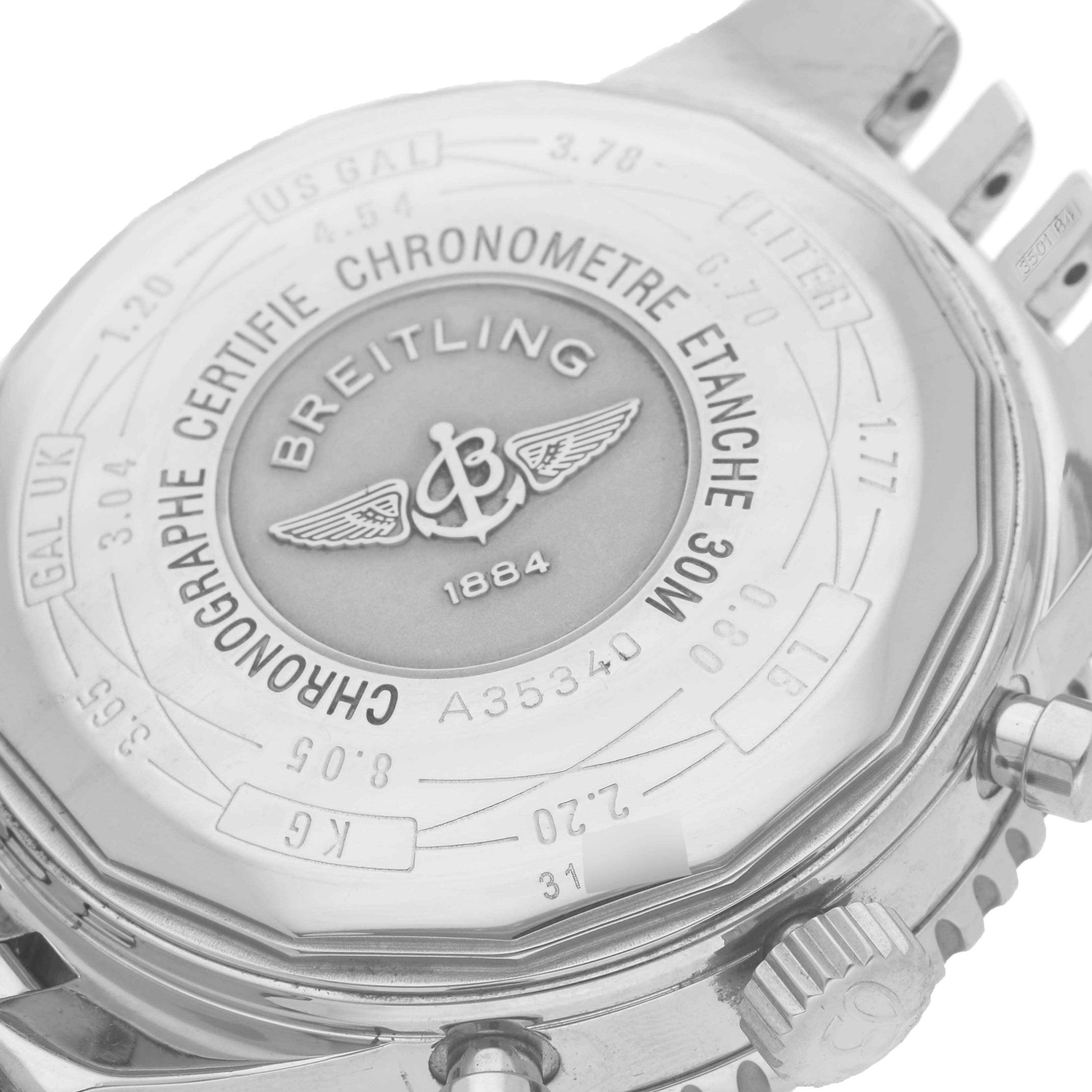 The image shows the back of the Breitling Navitimer A35340 Men's Stainless Steel Blue Dial A35340 Men's Stainless Steel Blue Dial watch, displaying its engraved details and chronograph controls.