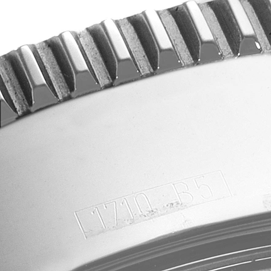 Close-up of the bezel edge and engraving on the Breitling Superocean A17364 Men's Stainless Steel Black Dial A17364 Men's Stainless Steel Black Dial watch.