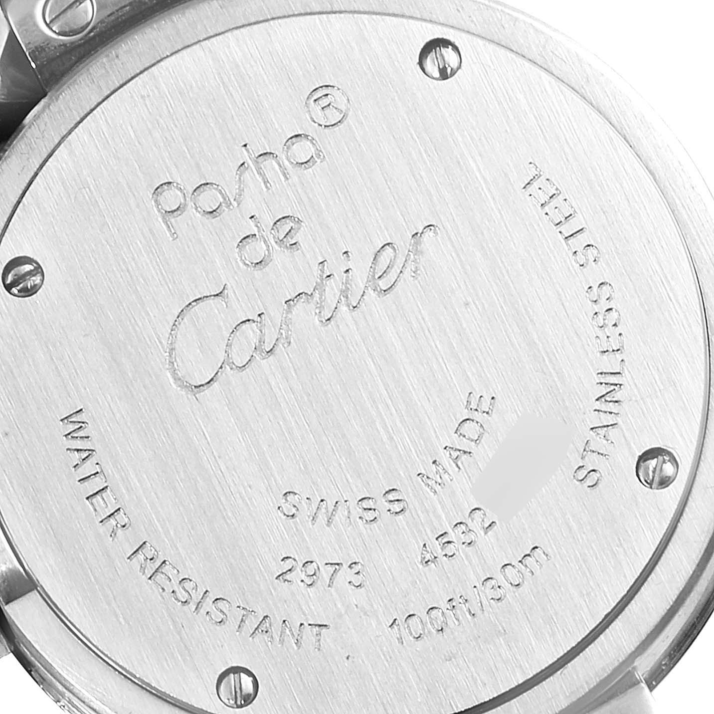 The image shows the case back of a Cartier Pasha W3140008 Women
s Stainless Steel Pink Dial W3140008 Women
s Stainless Steel Pink Dial watch, featuring engraved branding and specifications.