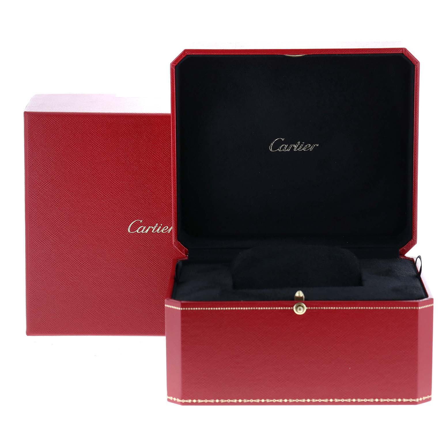 The image shows an open Cartier Panthere WSPN0007 Women
s Stainless Steel Silver Dial WSPN0007 Women
s Stainless Steel Silver Dial watch box with a black interior and red exterior.