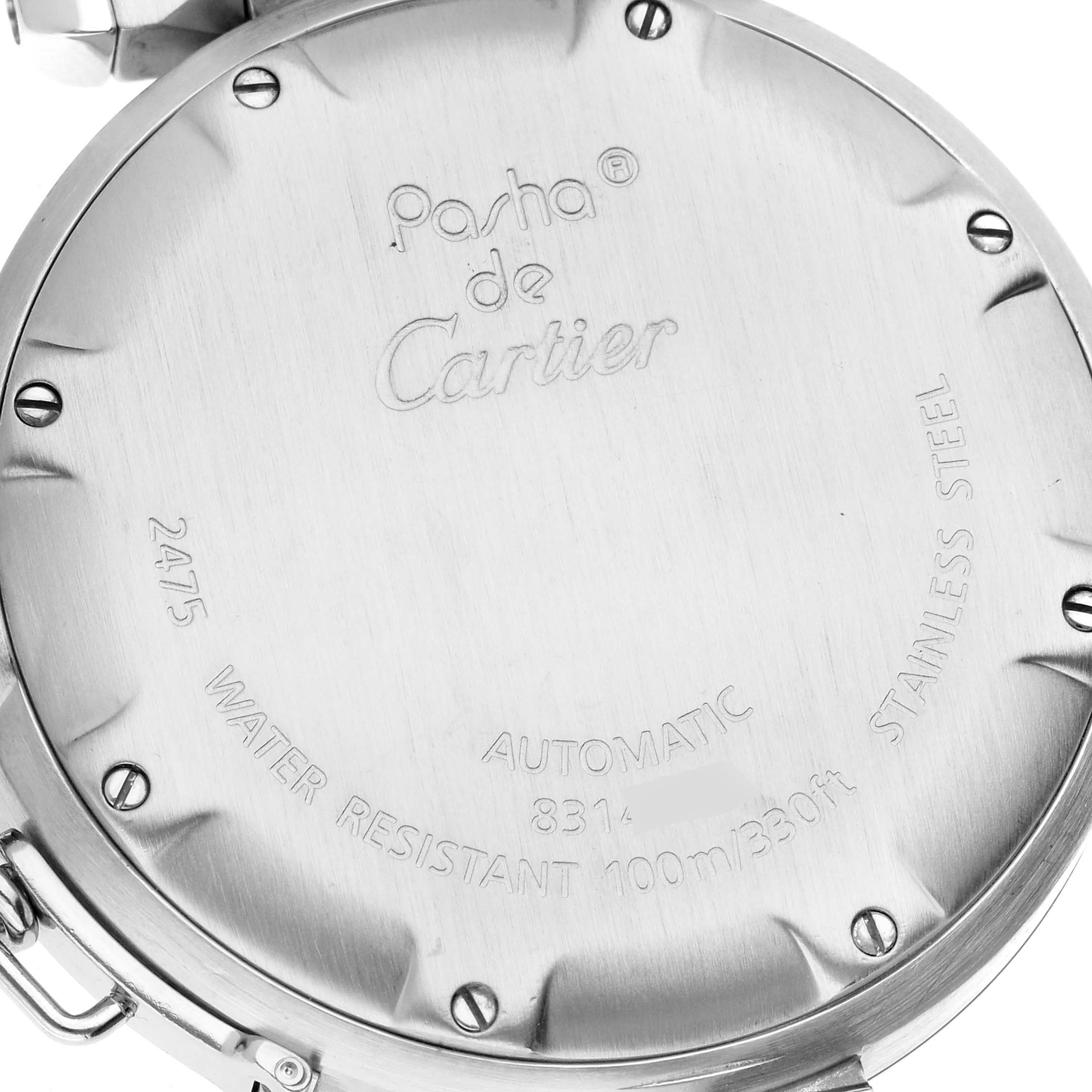 The image shows the case back of the Pasha de Cartier watch, displaying its brand, water resistance, and material.