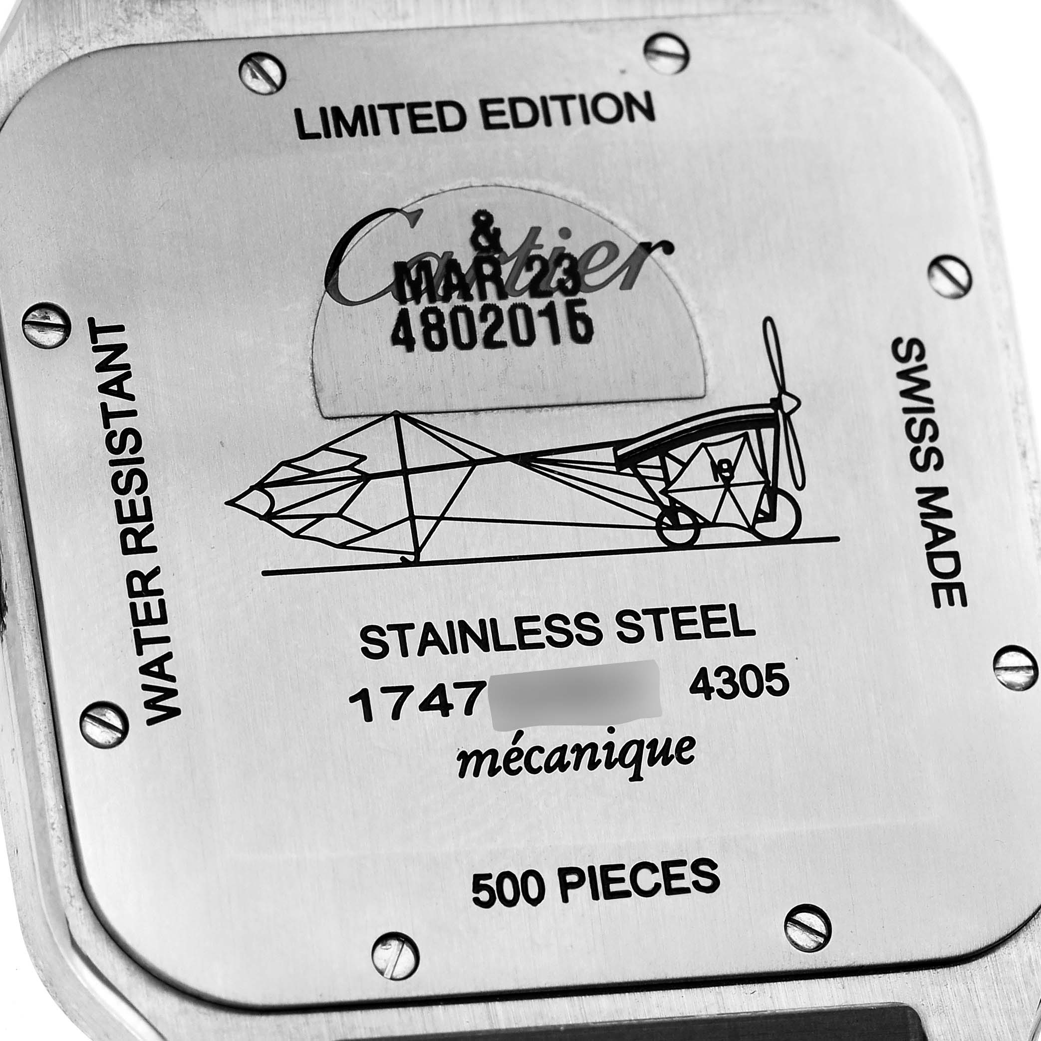 This image shows the back of a limited edition Santos Dumont watch by Cartier, highlighting "Limited Edition," serial number, and various engravings.