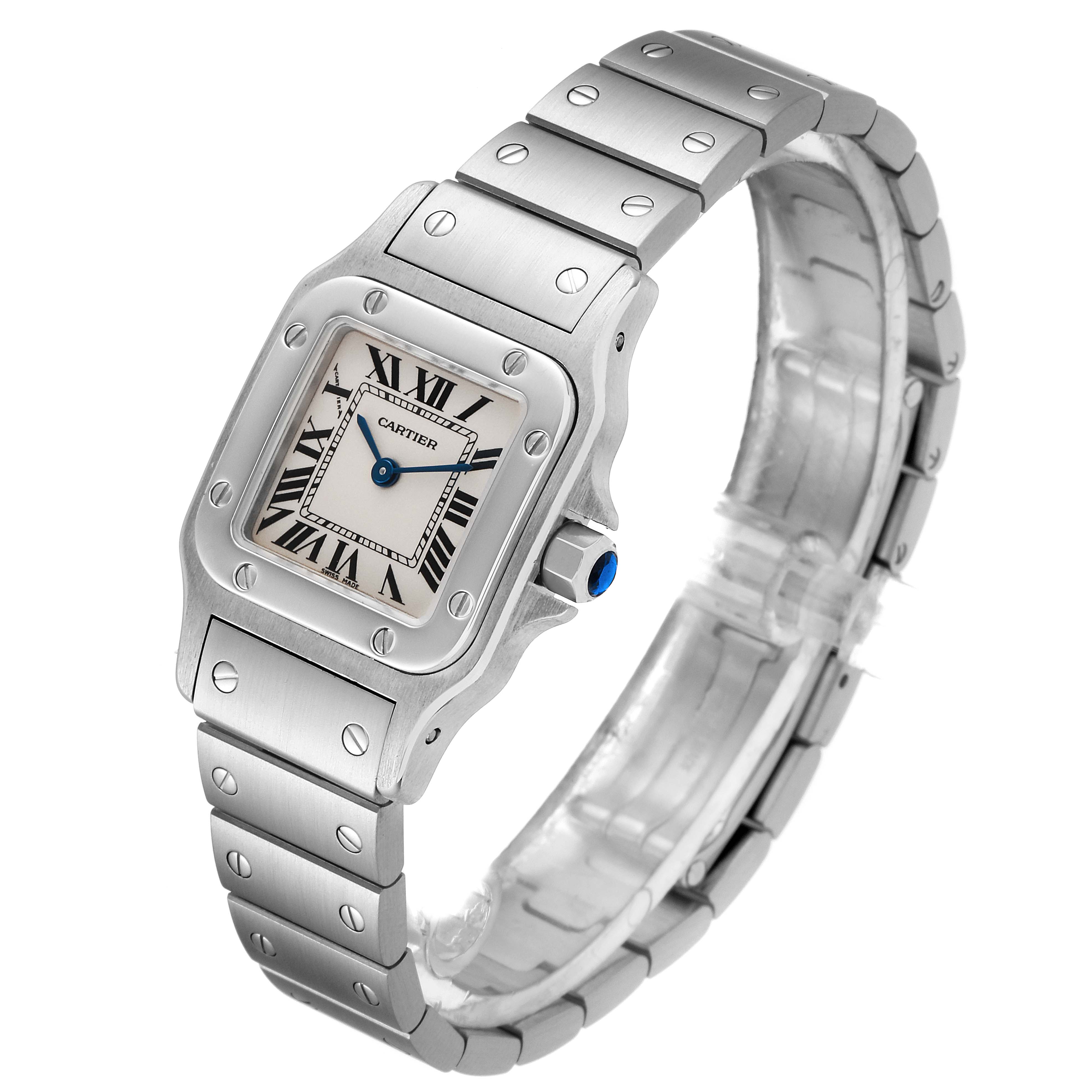 This image shows a Cartier Santos W20056D6 Women's Stainless Steel Silver Dial W20056D6 Women's Stainless Steel Silver Dial watch with a metal bracelet, viewed from an angled perspective displaying the dial and case.