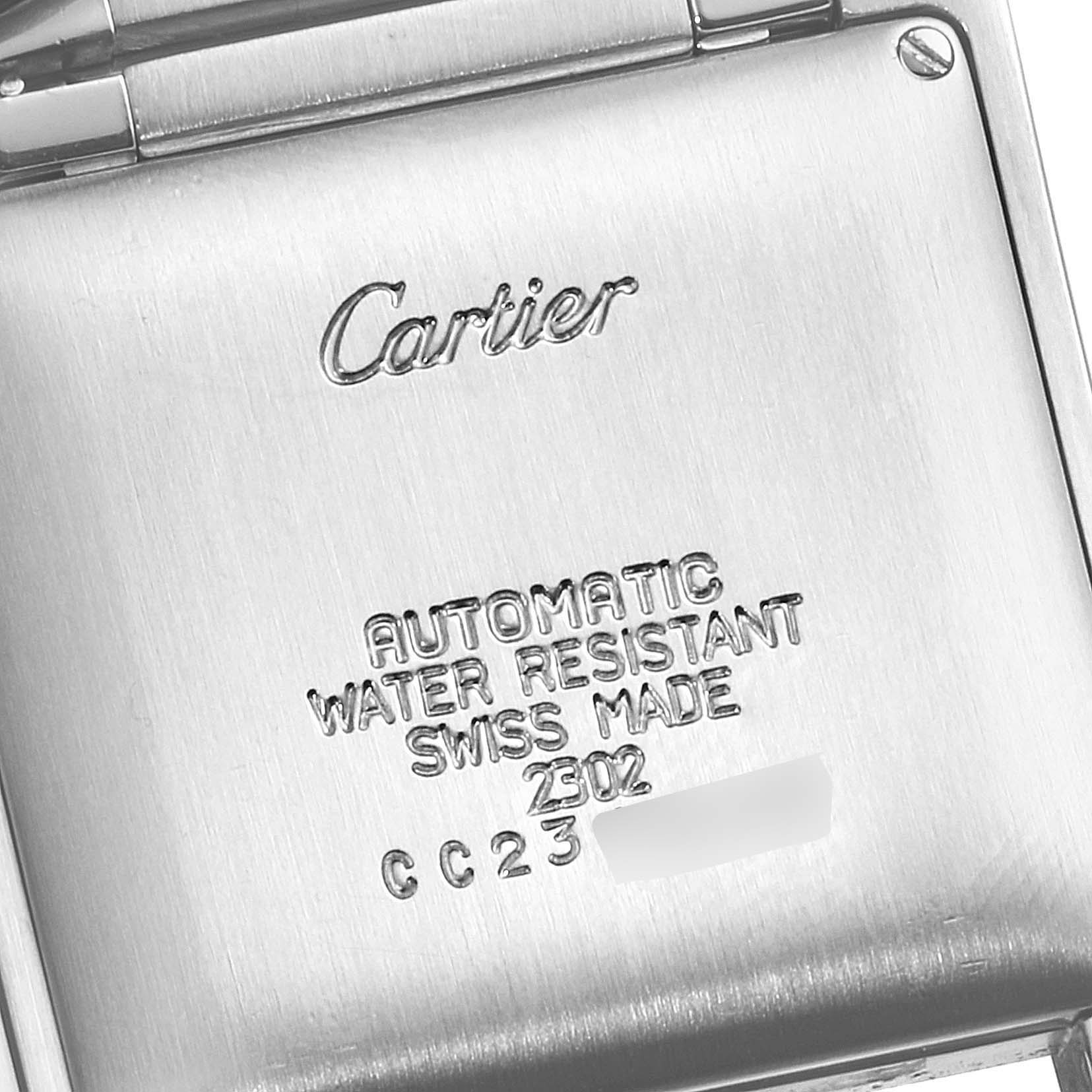 This image shows the back case of a Cartier Tank Francaise W51002Q3 Men's Stainless Steel Silver Dial W51002Q3 Men's Stainless Steel Silver Dial watch, highlighting its inscriptions and clasp.