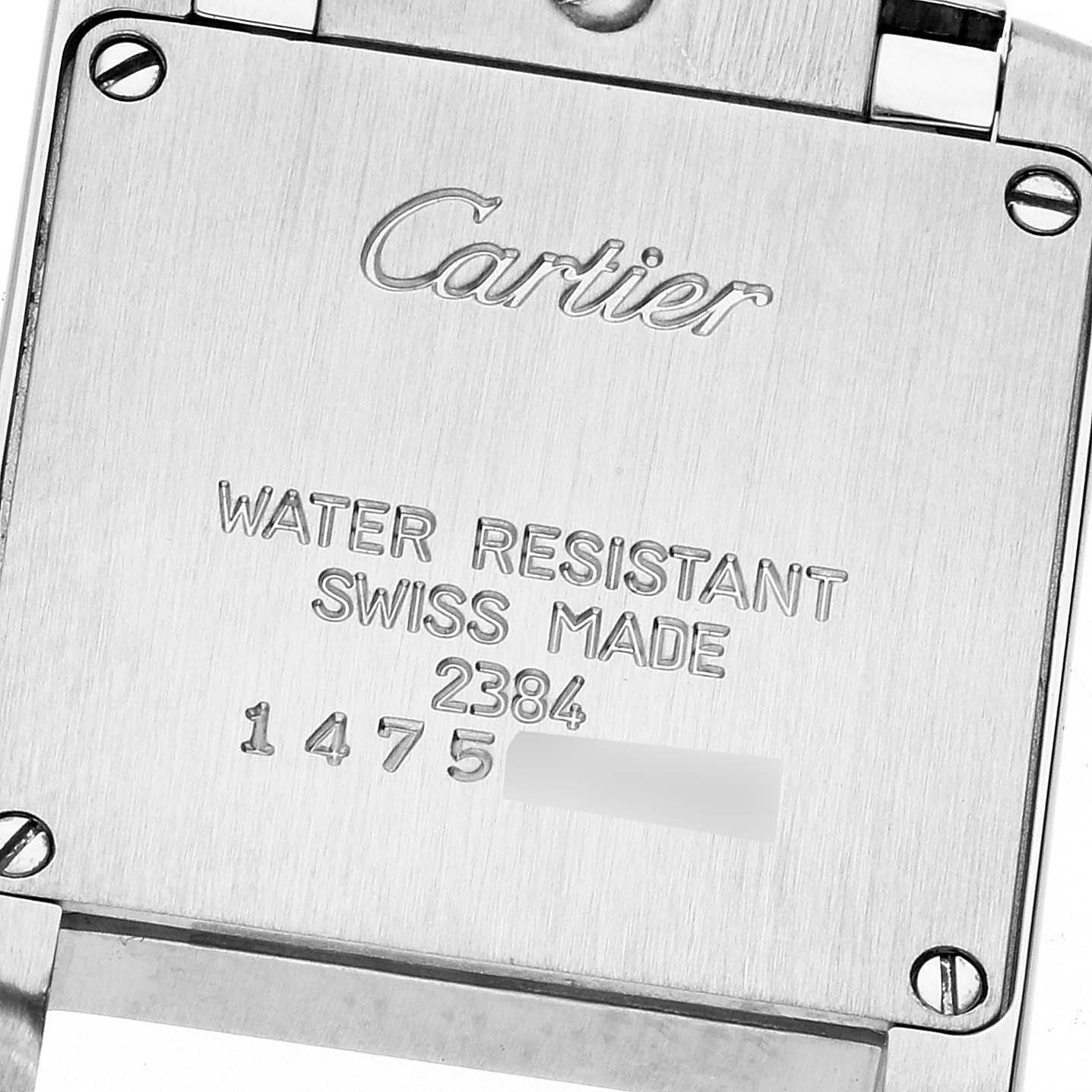 This image shows the case back of a Cartier Tank Française watch, displaying the brand, model, and specifications.