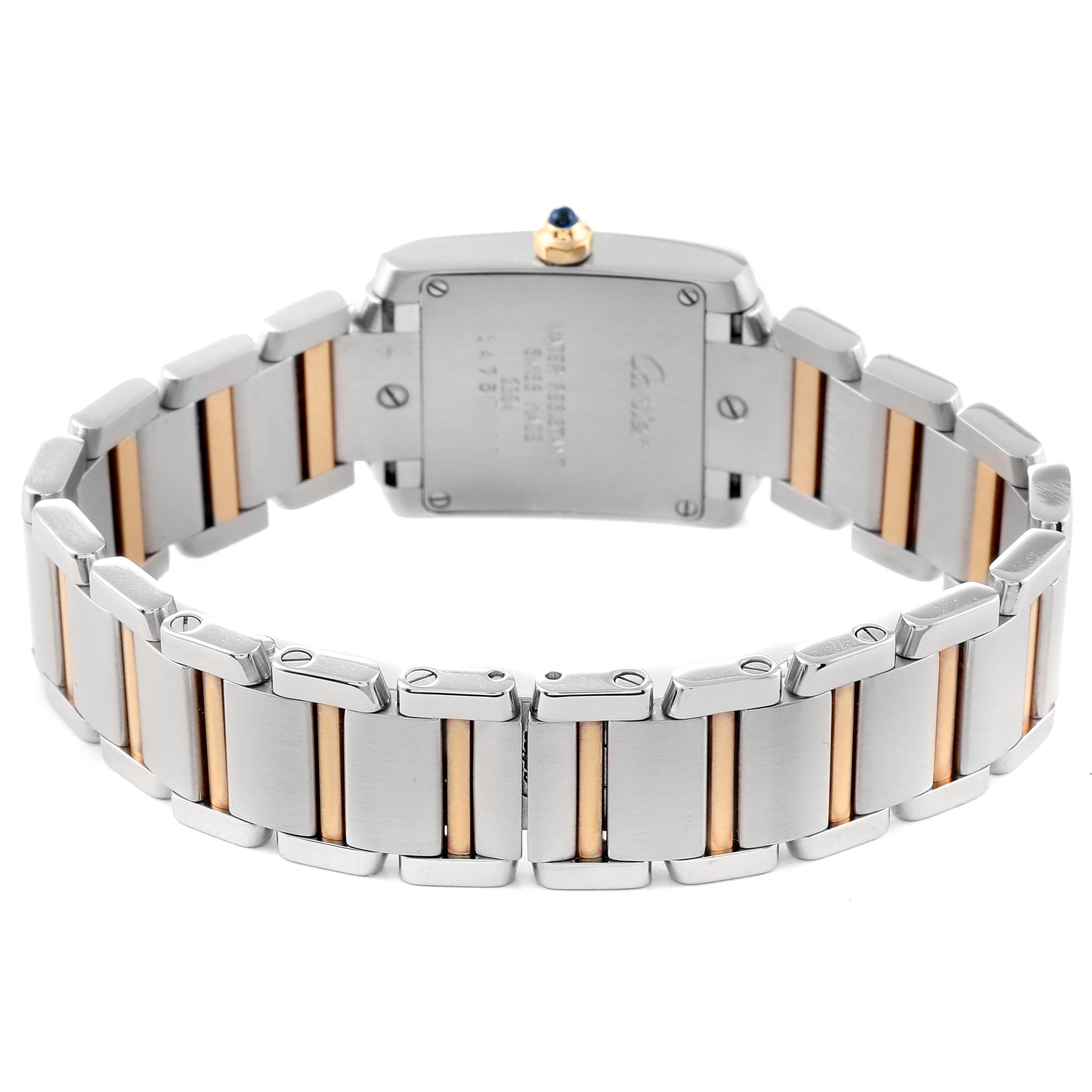 The image shows the back view of the Cartier Tank Française watch, highlighting its stainless steel and gold bracelet.