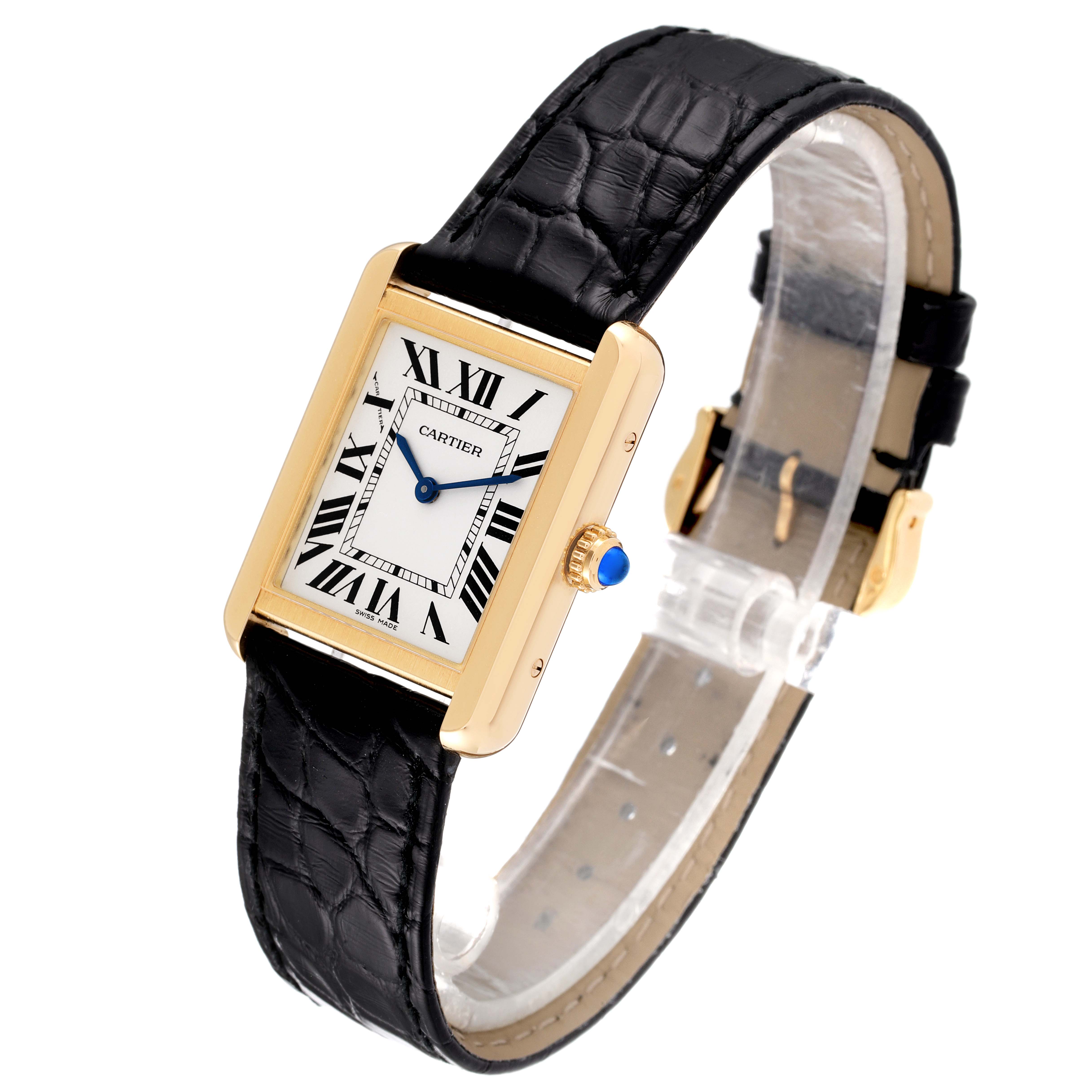The image shows a Cartier Tank Solo W5200002 Women's Yellow Gold Silver Dial W5200002 Women's Yellow Gold Silver Dial watch with a gold rectangular case, black leather strap, and Roman numeral dial, viewed at an angle.