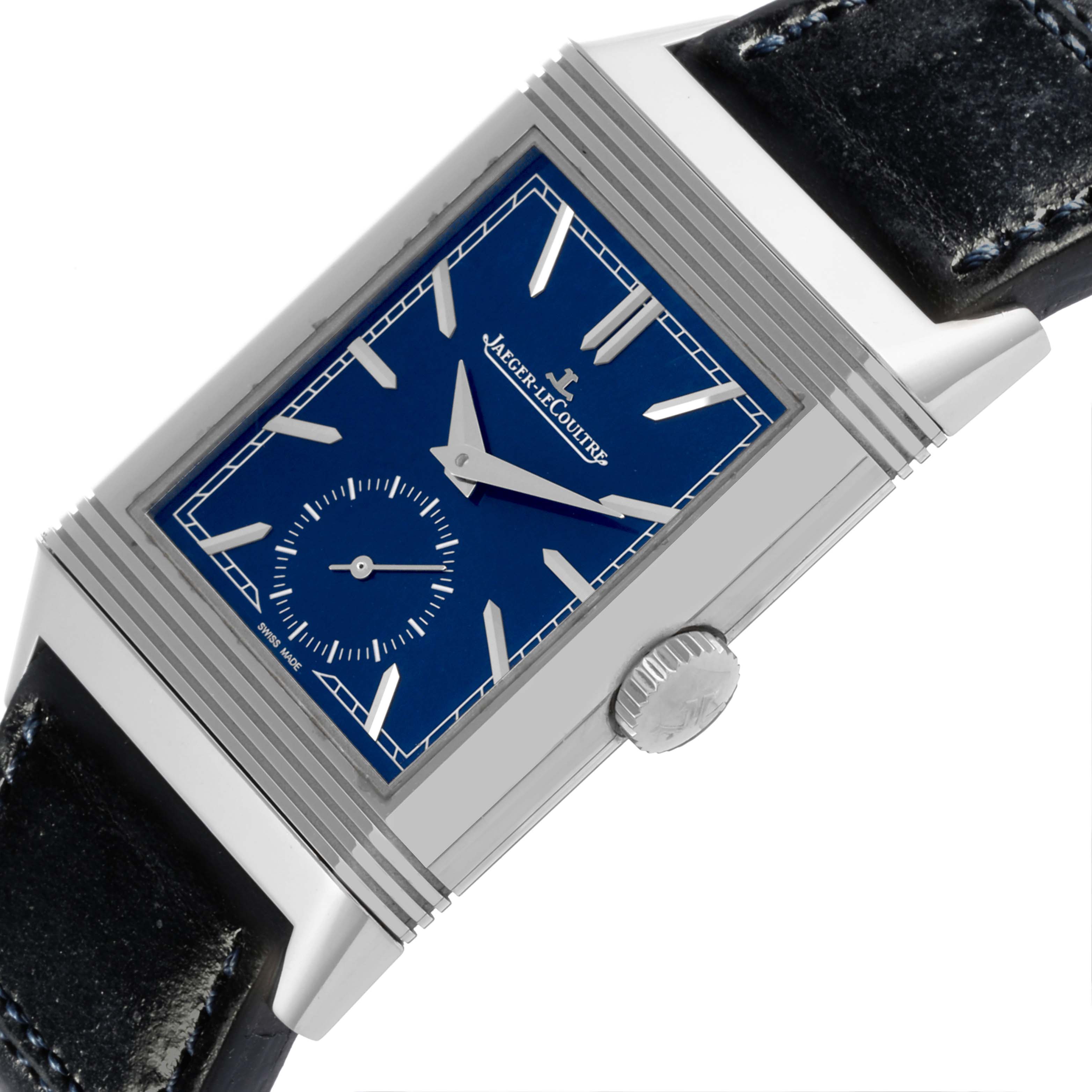 The Jaeger LeCoultre Reverso Q3978480 Men's Stainless Steel Blue Dial Q3978480 Men's Stainless Steel Blue Dial watch is shown at an angled side view, highlighting the face, crown, and part of the strap.