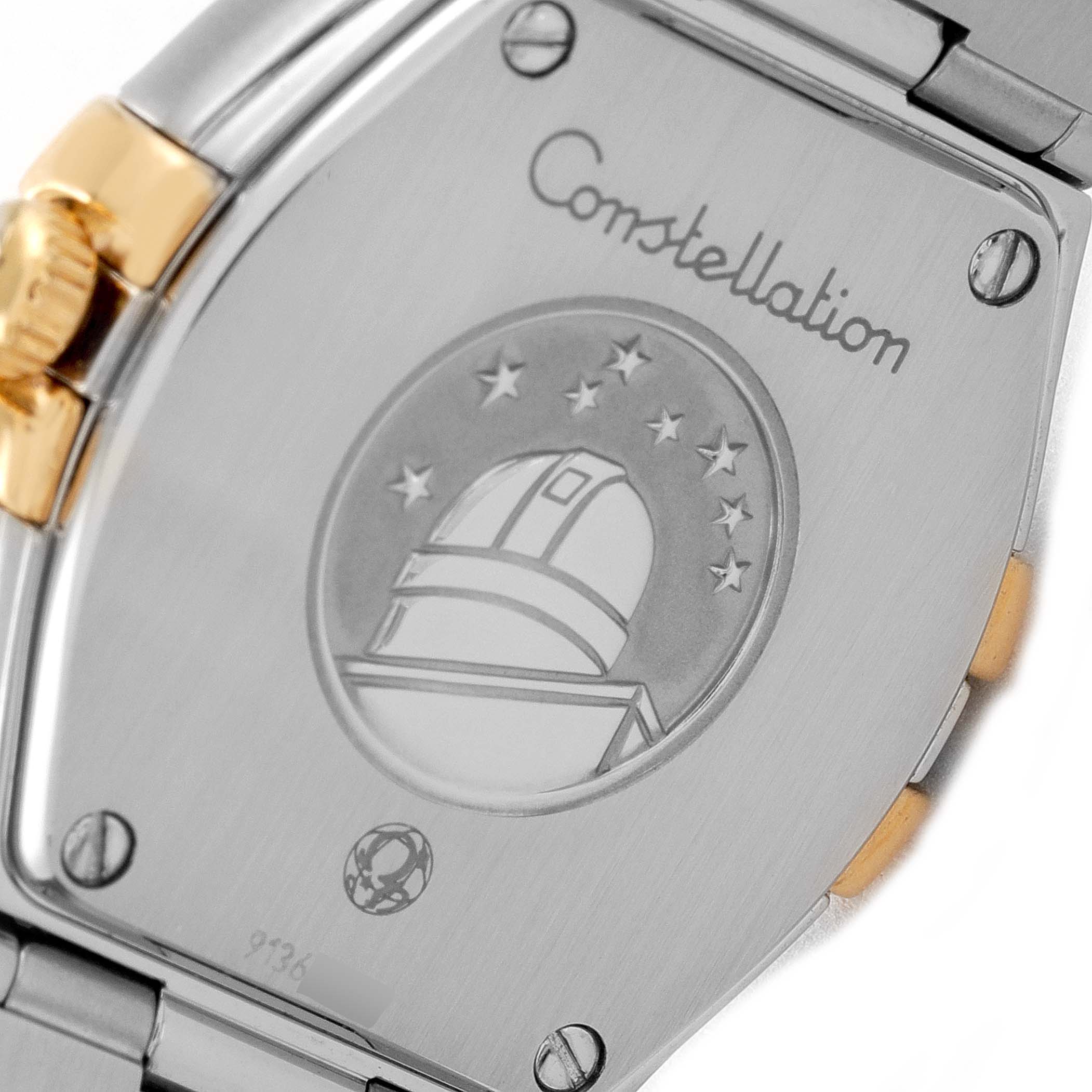 The image shows the back case of the Omega 123.25.24.60.52.002 Women's Steel and Gold (two tone) Silver Dial 123.25.24.60.52.002 Women's Steel and Gold (two tone) Silver Dial Constellation Steel Yellow Gold Diamond Ladies Watch 123.25.24.60.52.002.