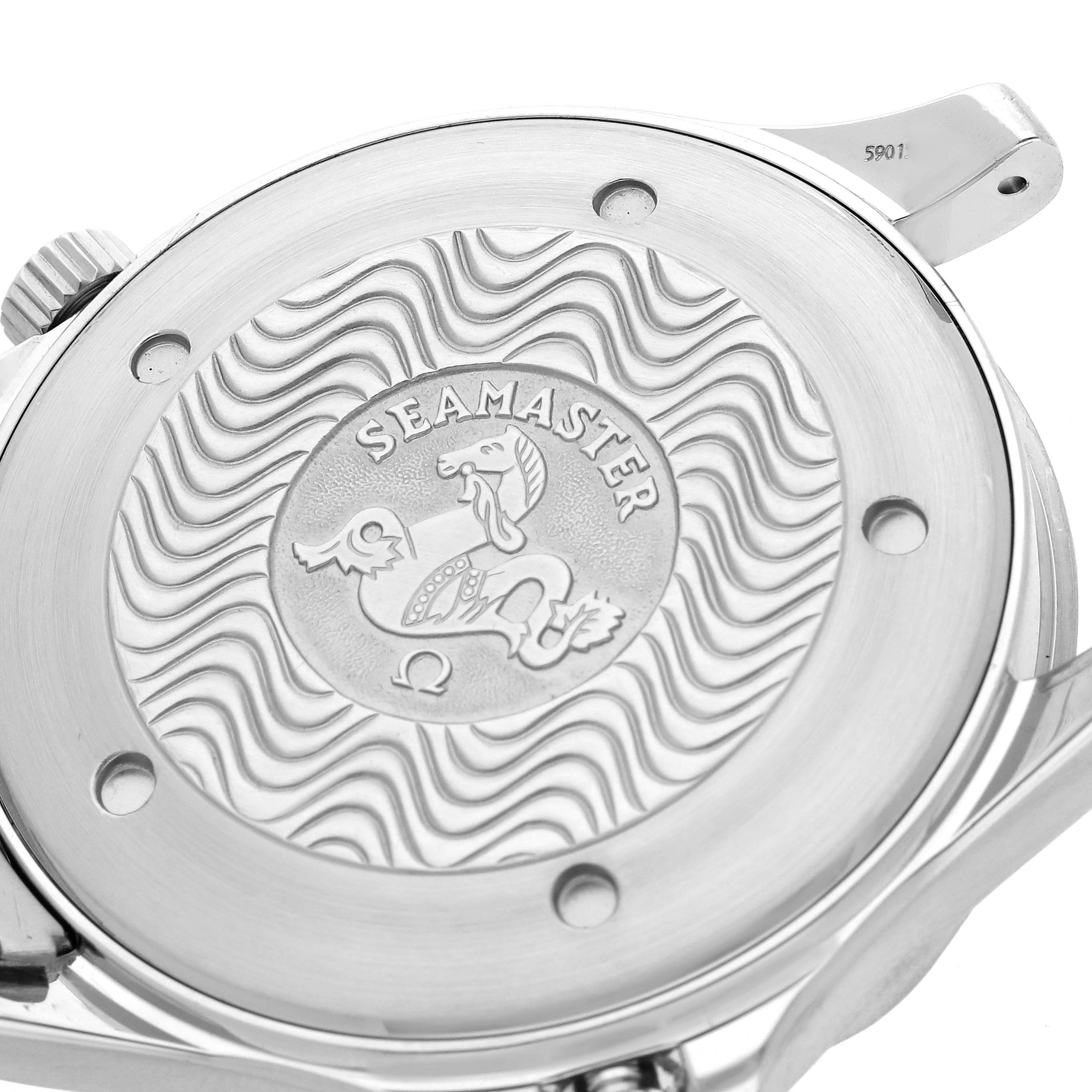 The image shows the back case of the Omega Seamaster 2541.80.00 Men
s Stainless Steel Blue Dial 2541.80.00 Men
s Stainless Steel Blue Dial watch from a top angle, highlighting its engraved design.