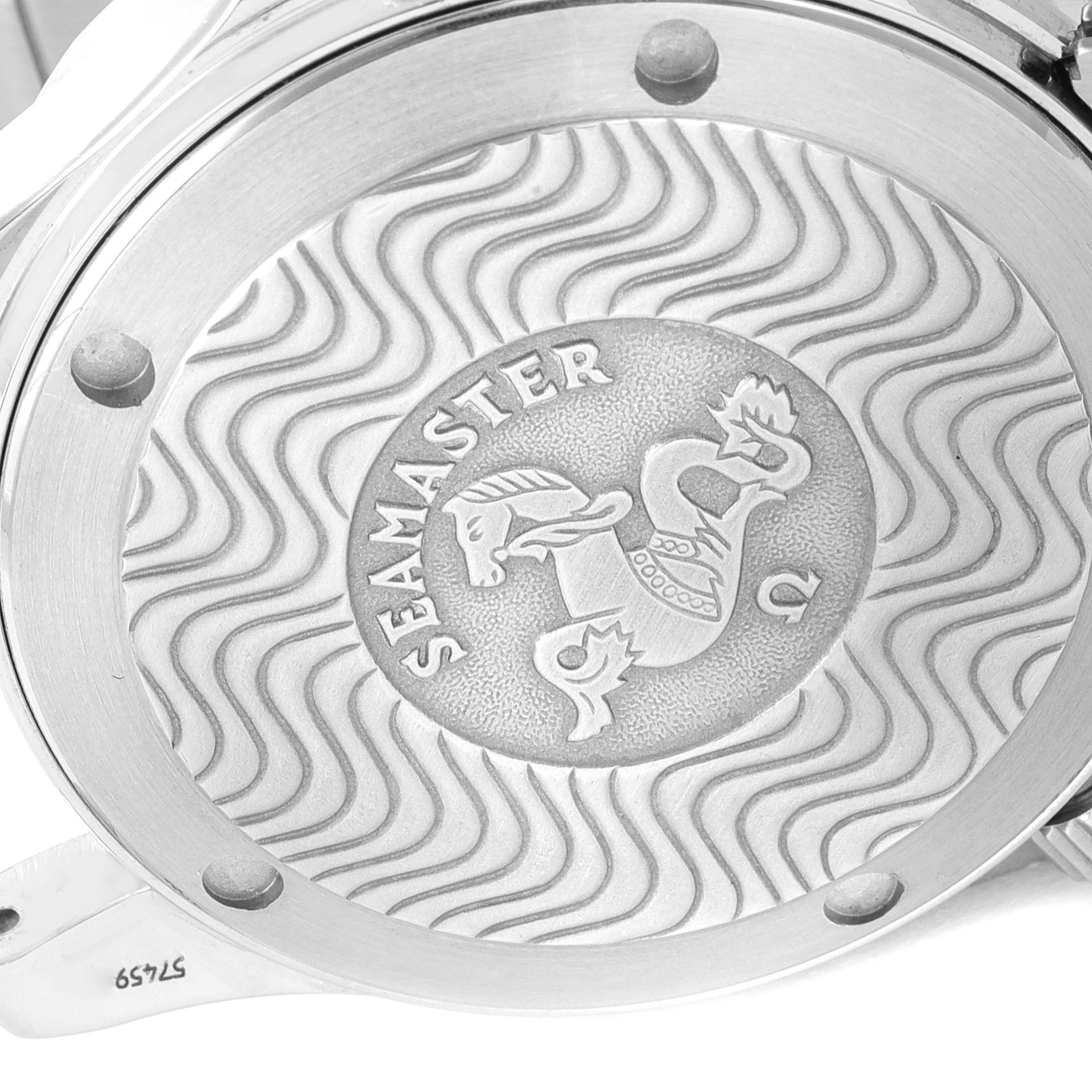 The image shows the case back of an Omega Seamaster 2561.80.00 Men's Stainless Steel Blue Dial 2561.80.00 Men's Stainless Steel Blue Dial watch with the engraved logo and wave pattern design.