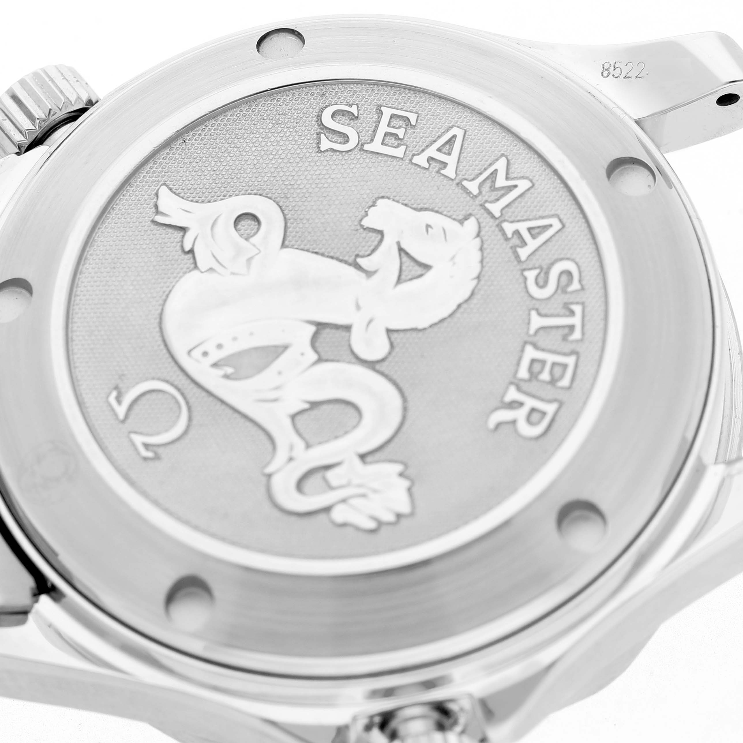 The image shows the back case of an Omega Seamaster 2222.80.00 Men's Stainless Steel Blue Dial watch, highlighting the embossed logo and "Seamaster" text.