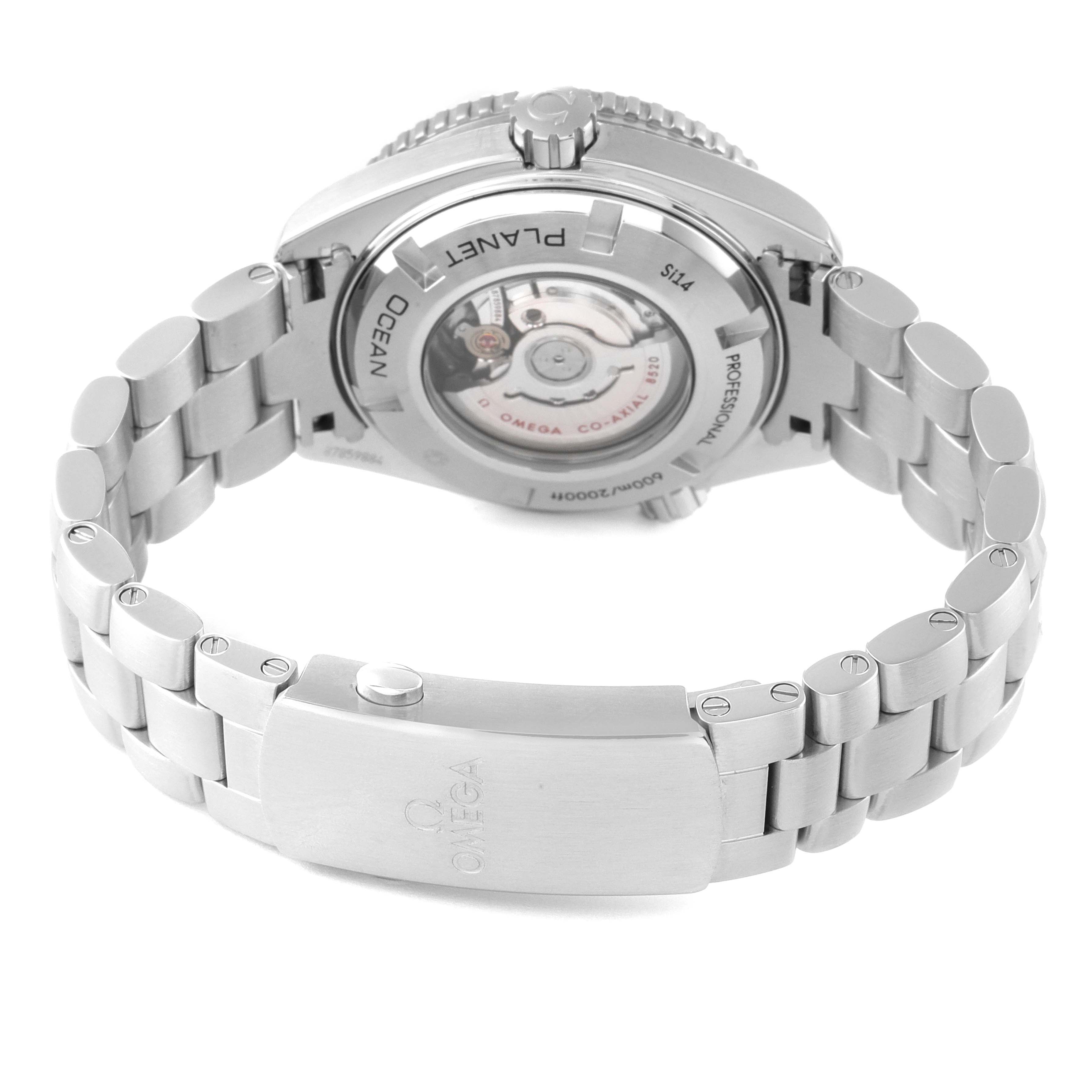 The image shows the back casing and metal bracelet of the Omega Planet Ocean 232.30.38.20.01.001 Men
s Stainless Steel Black Dial 232.30.38.20.01.001 Men
s Stainless Steel Black Dial watch, highlighting its mechanism and clasp.