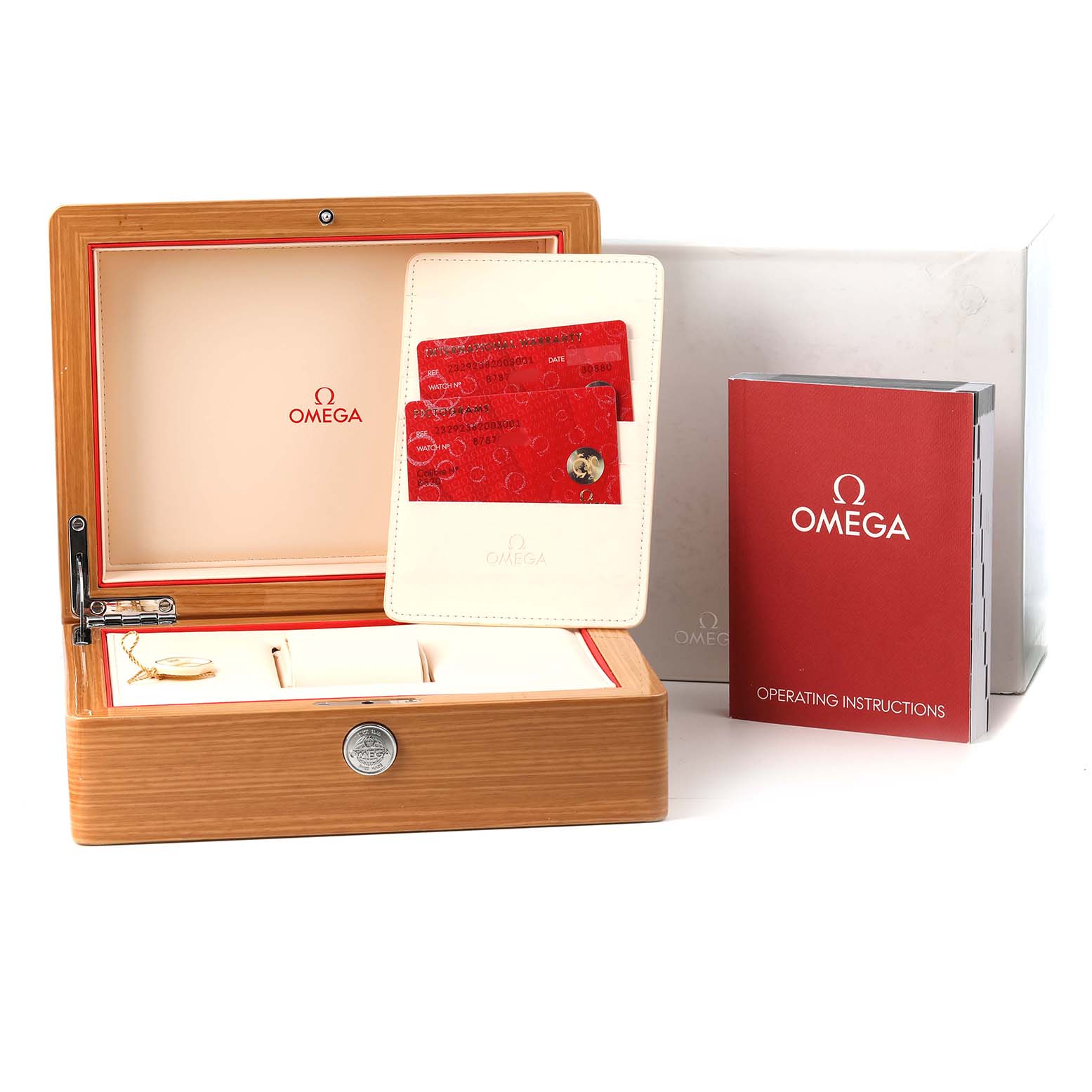 The image shows the Omega Planet Ocean 232.92.38.20.03.001 Men's Titanium Blue Dial packaging with a wooden box, cards, and an instruction manual.