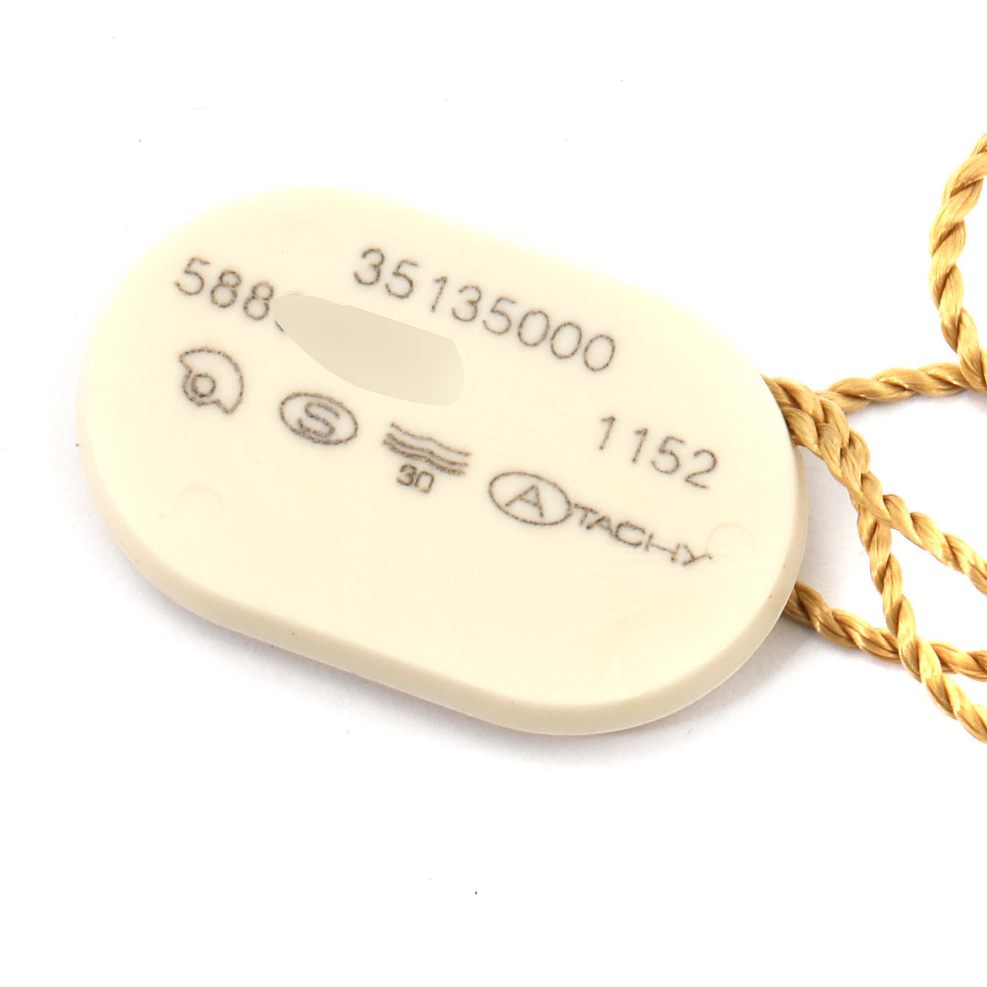 This image shows a white tag with model information for an Omega Speedmaster 3513.50.00 Men
s Stainless Steel Black Dial 3513.50.00 Men
s Stainless Steel Black Dial watch, featuring a gold string.