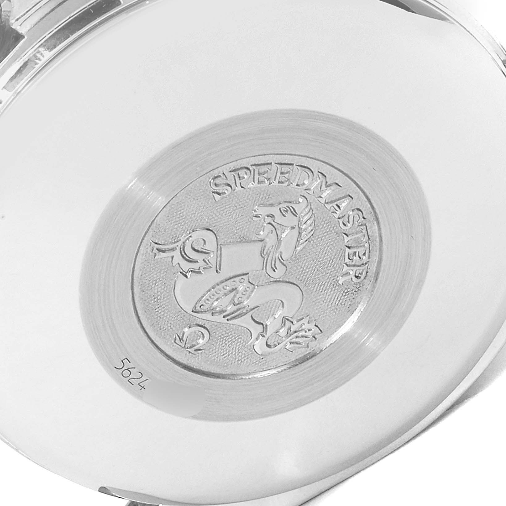 The image shows the back case of an Omega Speedmaster 3511.80.00 Men
s Stainless Steel Blue Dial 3511.80.00 Men
s Stainless Steel Blue Dial watch, featuring an engraved logo and model name.