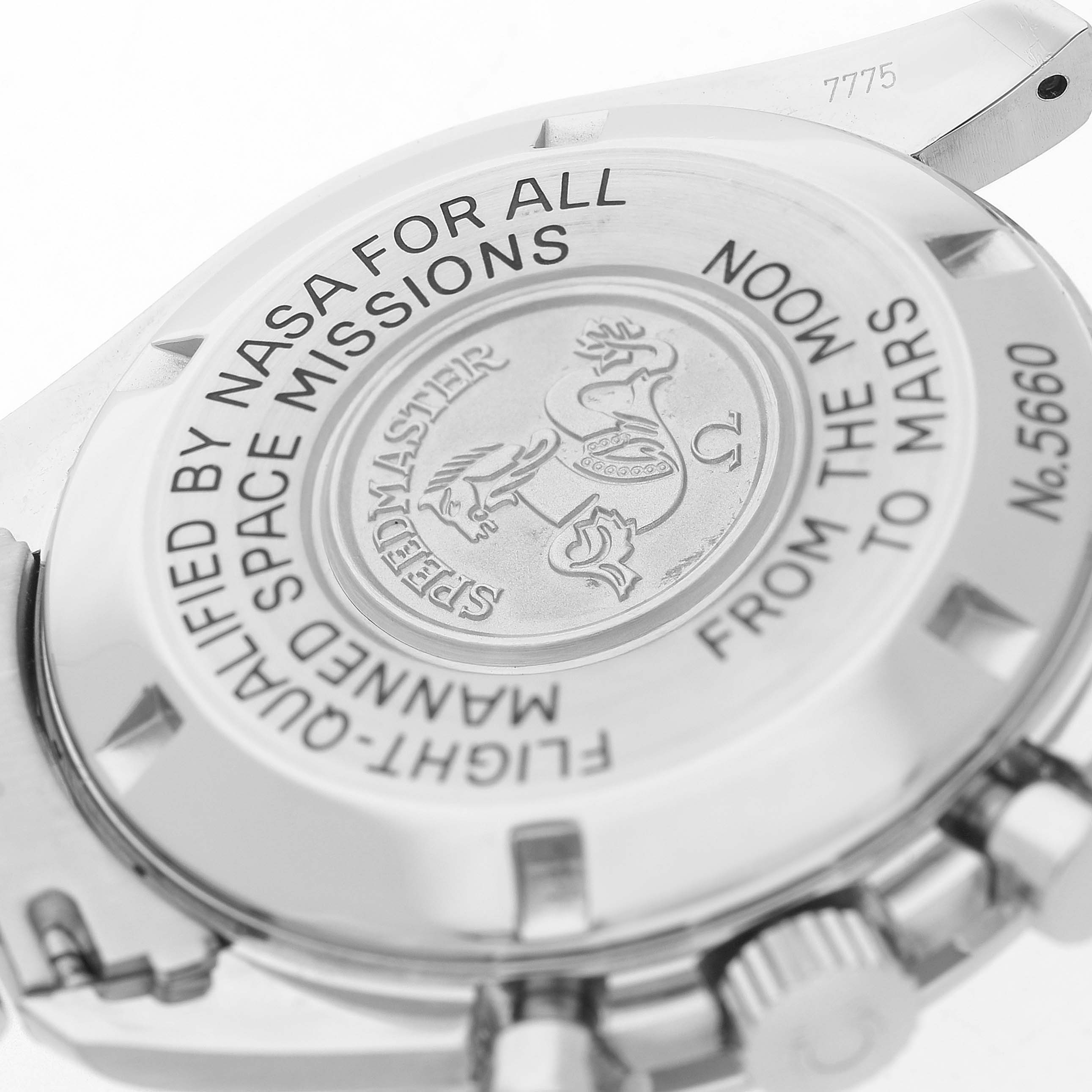 The image shows the case back of the Omega Speedmaster 3577.50.00 Men's Stainless Steel Black Dial, highlighting engravings and branding details.