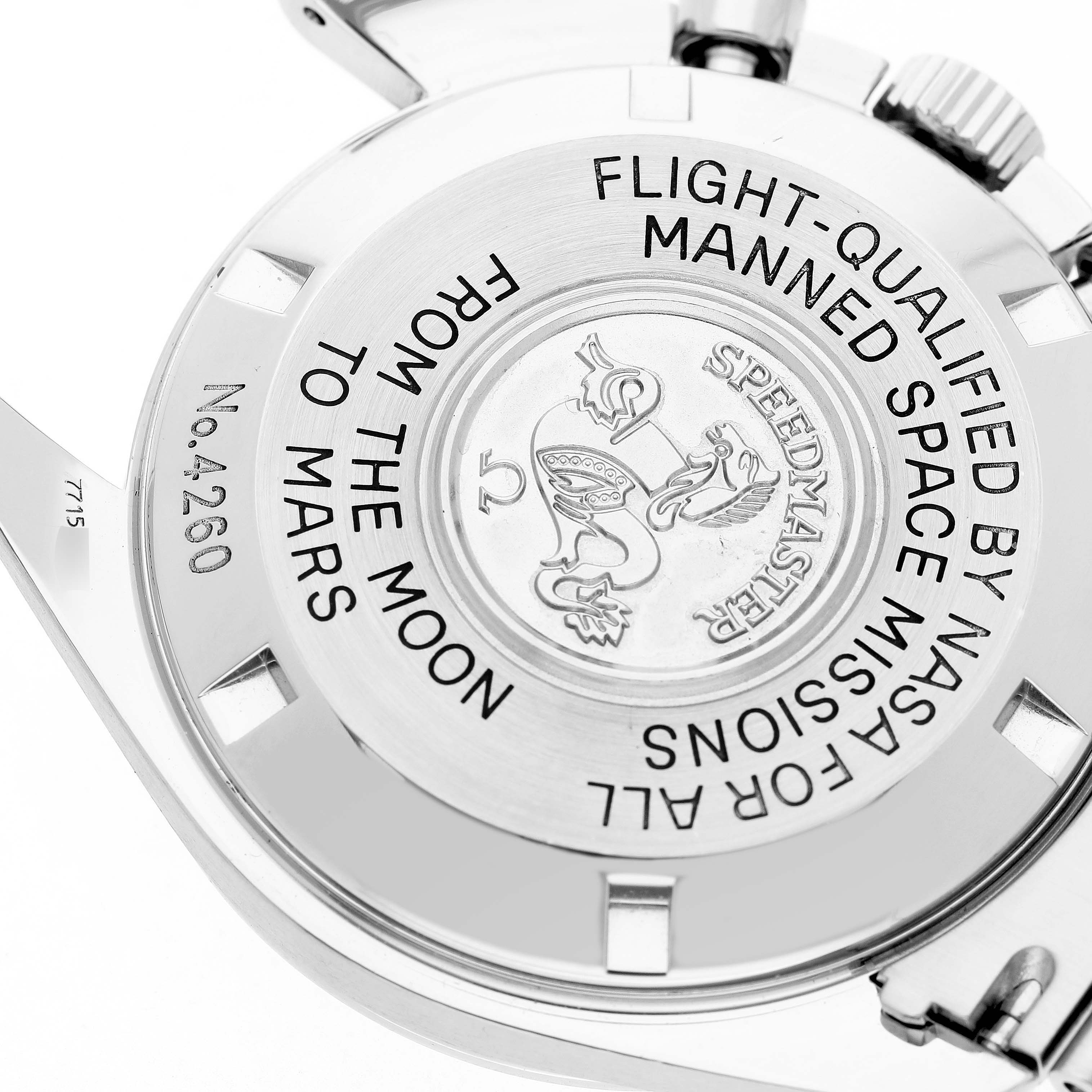 The image shows the case back of an Omega Speedmaster 3577.50.00 Men's Stainless Steel Black Dial, highlighting engravings and a medallion.