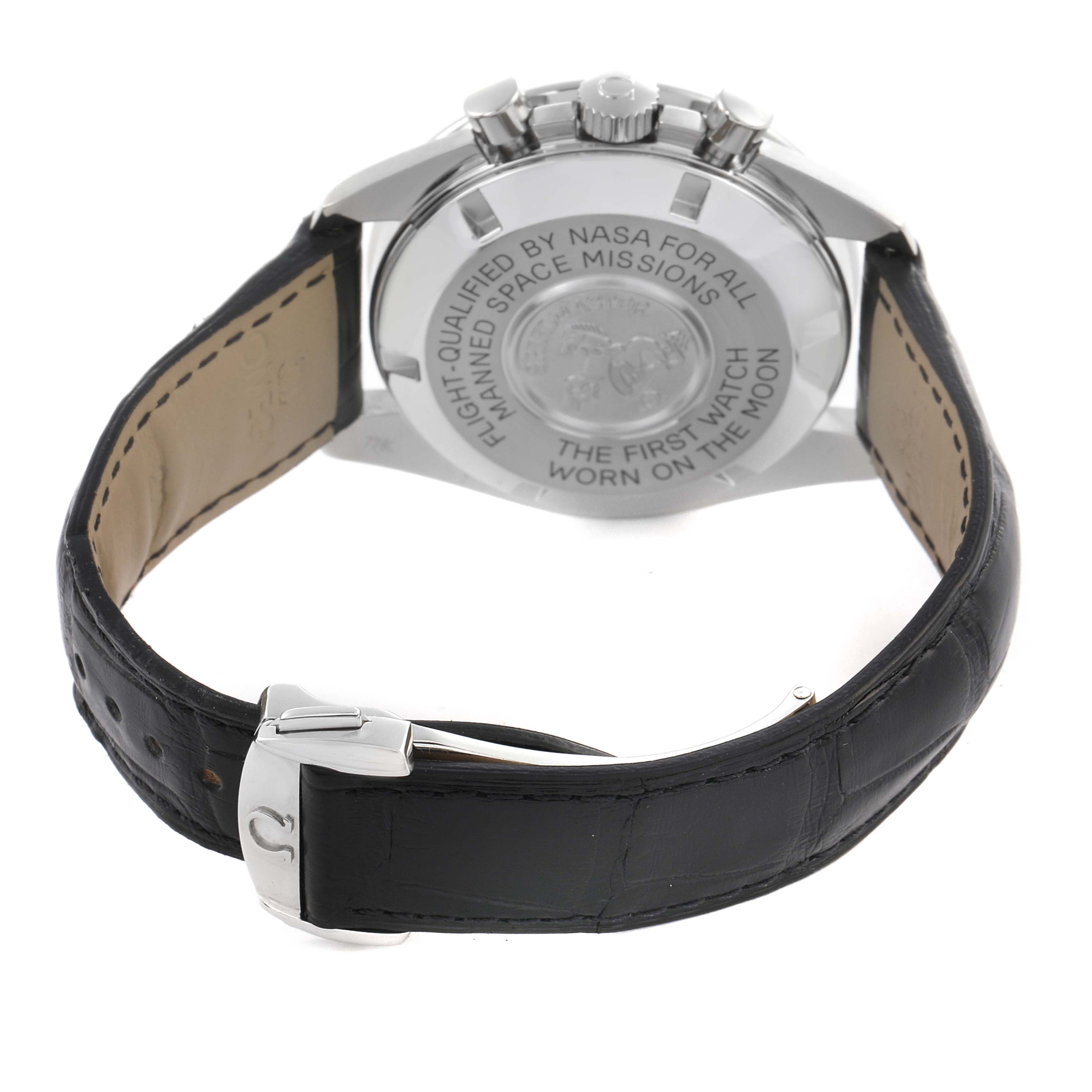 The Omega Speedmaster 3870.50.31 Men's Stainless Steel Black Dial 3870.50.31 Men's Stainless Steel Black Dial is shown from the back, highlighting the case back engravings and leather strap.
