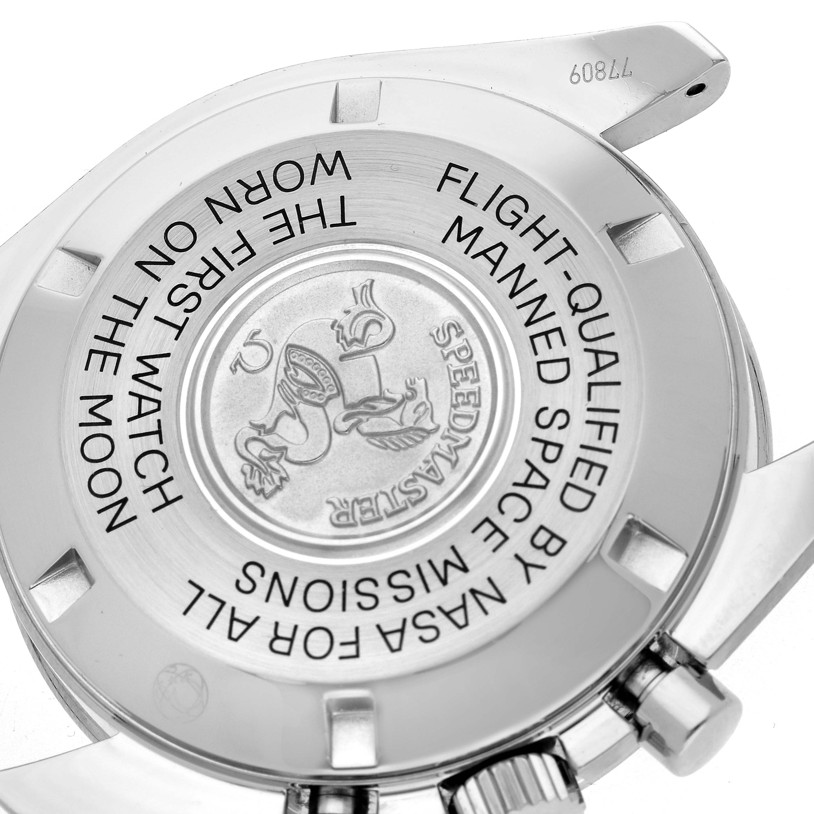 The Omega Speedmaster 3870.50.31 Men's Stainless Steel Black Dial 3870.50.31 Men's Stainless Steel Black Dial watch is shown from the back with engraved text and emblem, displaying the case back and lugs.